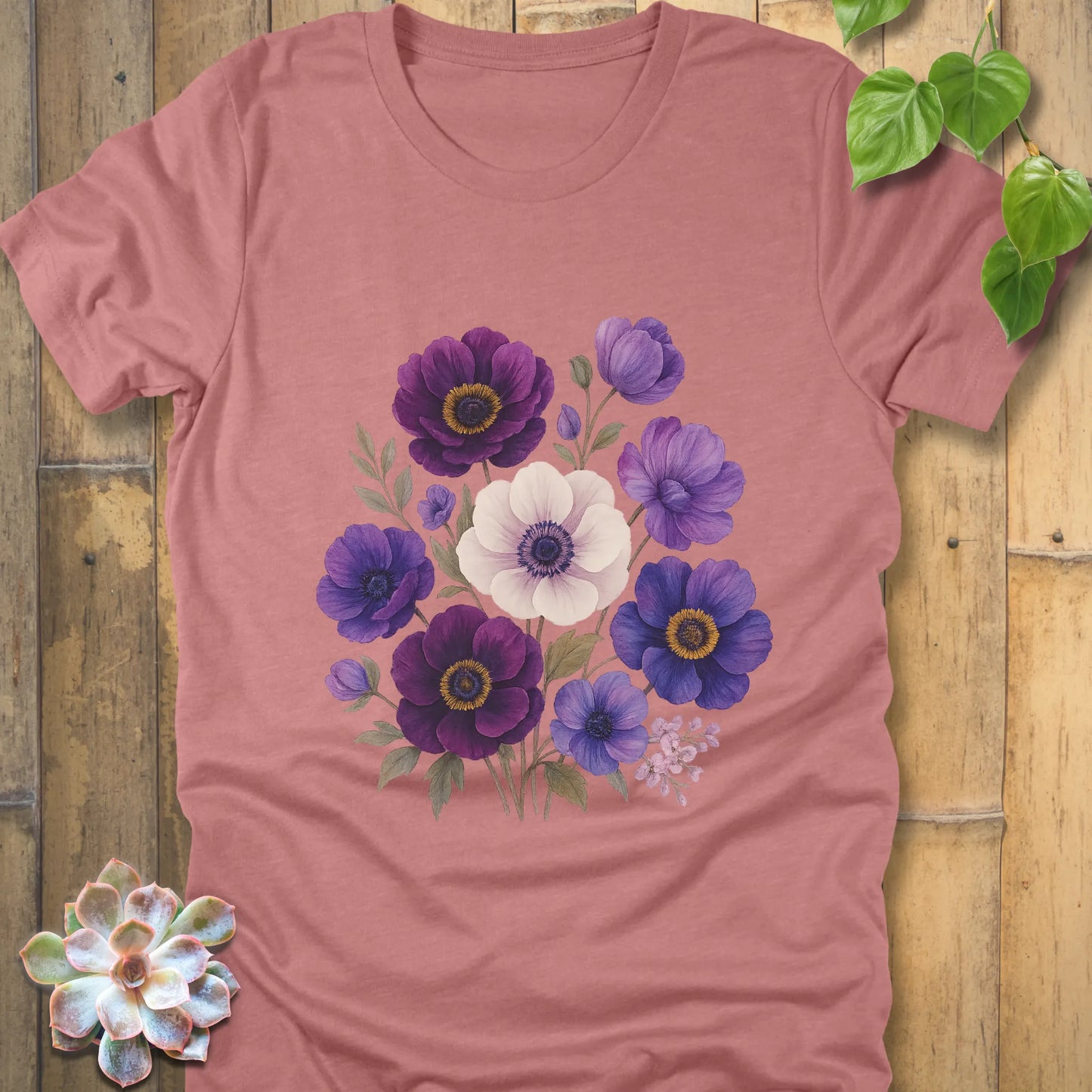Heather Mauve t-shirt with a central design of a flower bouquet in purple, violet, blue, and white tones with green leaves.