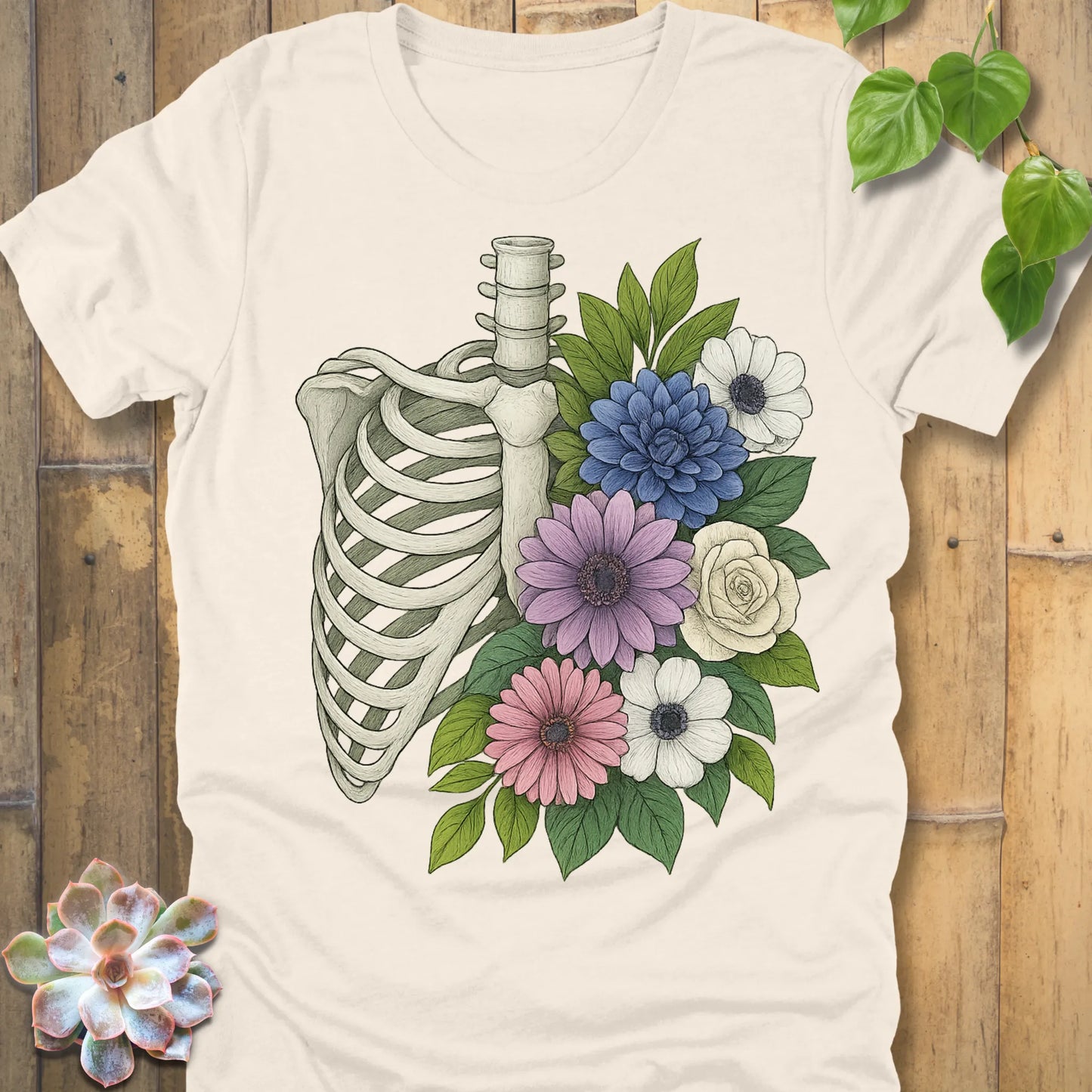 Floral Bones T-shirt in Natural – ribcage and blooms design on eco-friendly Bella+Canvas cotton tee, breathable and soft