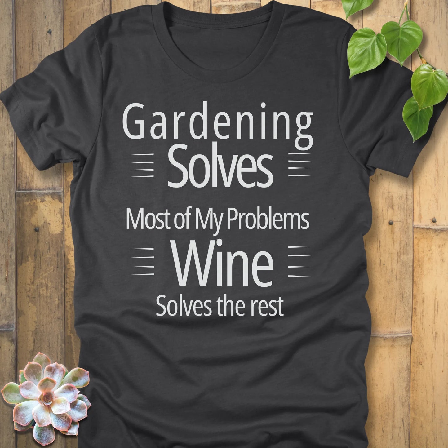Heather peach t-shirt featuring the design Gardening solves most of my problems, wine solves the rest printed in bold black letters.