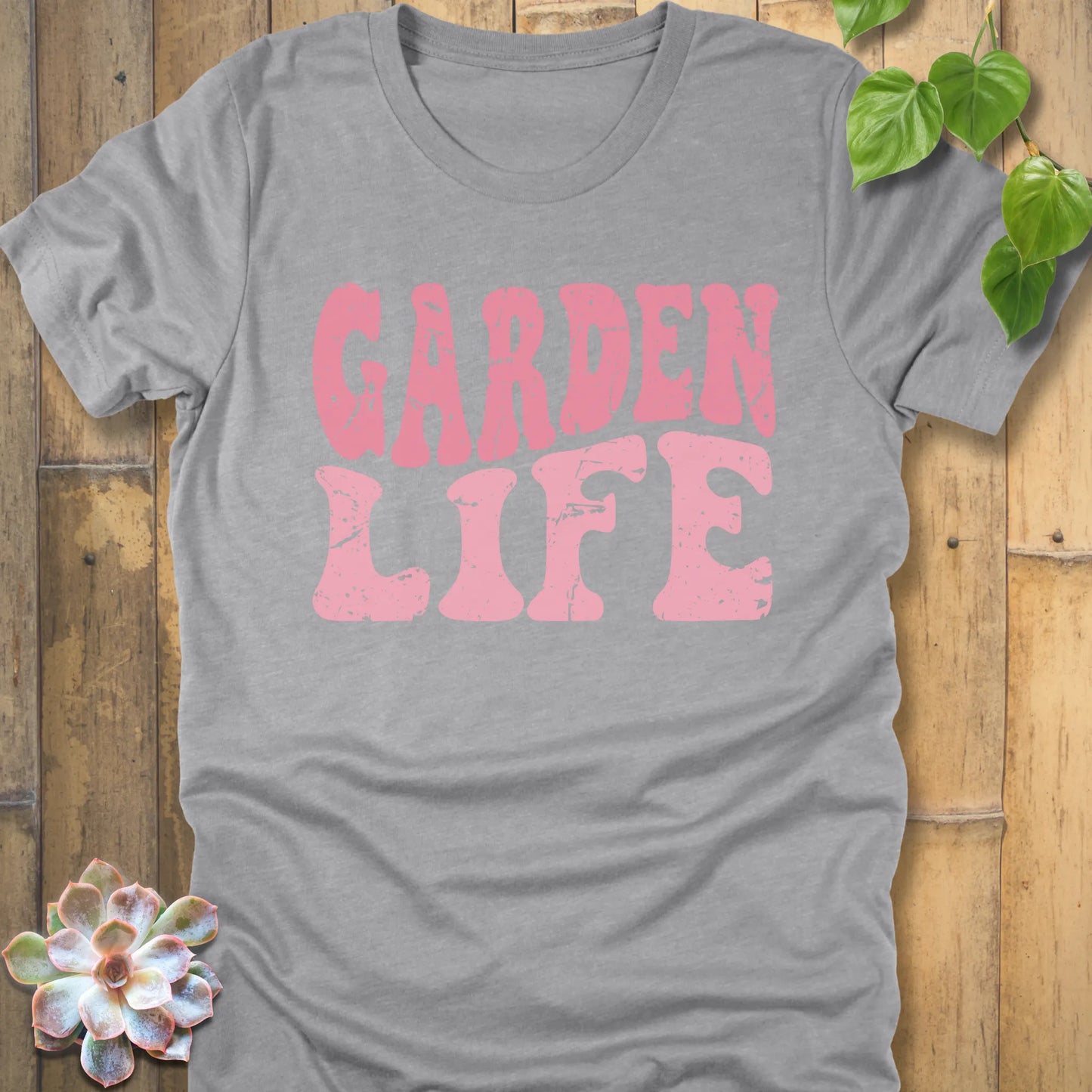Athletic Heather t-shirt featuring the Garden Life graphic tee design in bold pink letters, casual graphic shirt