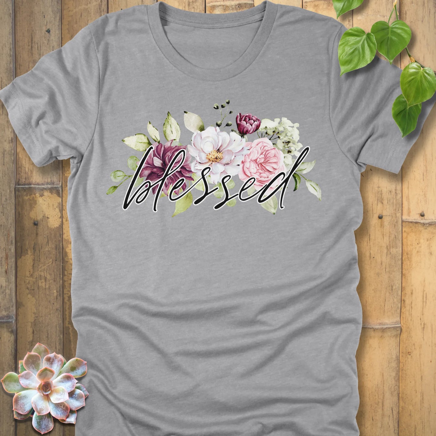 Athletic Heather t-shirt featuring the design Blessed Flowers printed black letters and flowers, faith and floral shirt.