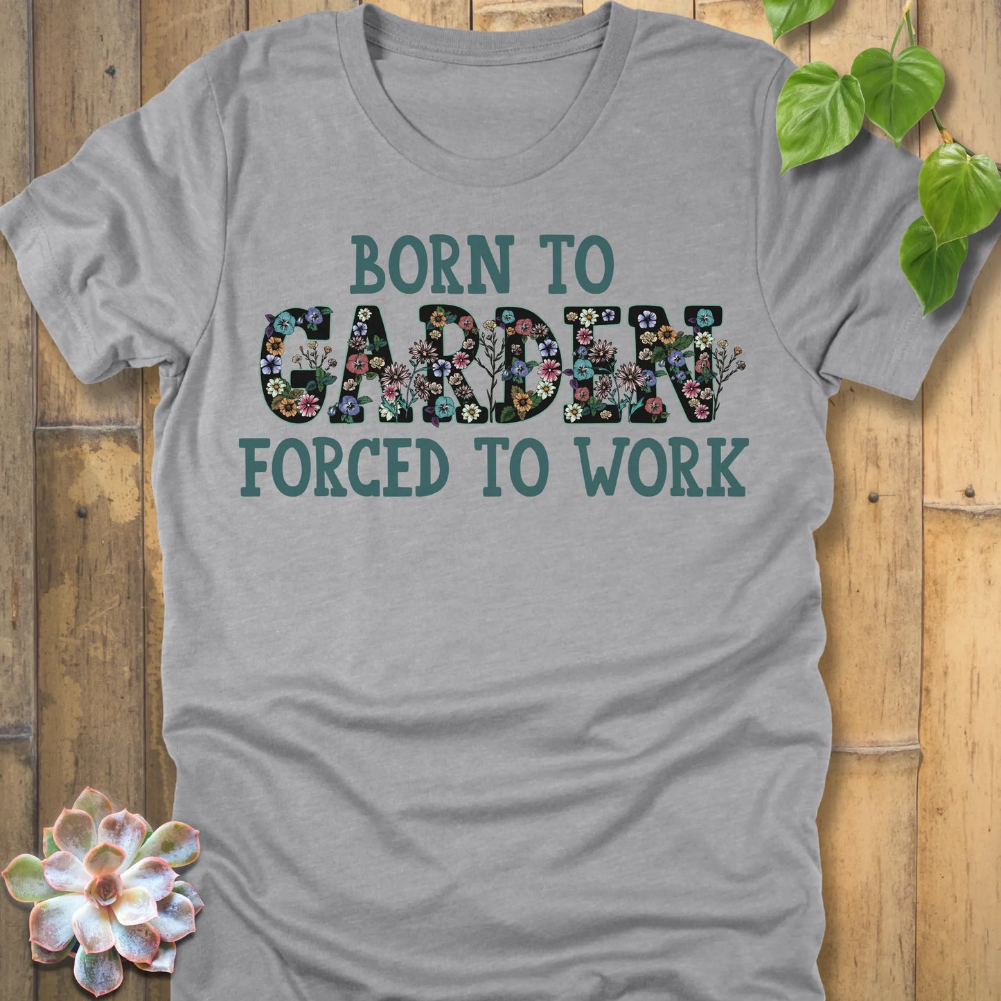 Athletic Heather t-shirt featuring the design Born To Garden printed in bold letters, gardening lover shirt