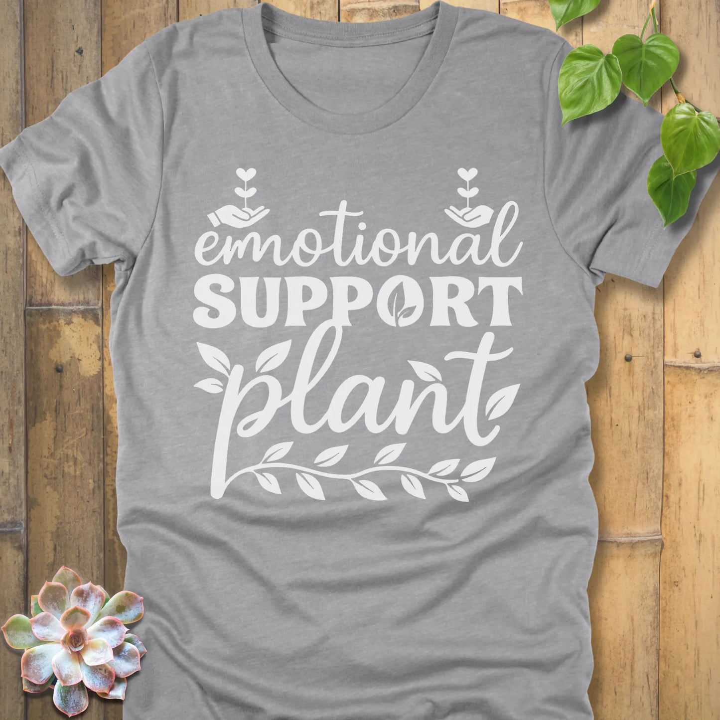 Athletic Heather t-shirt featuring the design Emotional Support printed in bold white letters, casual mental health shirt.