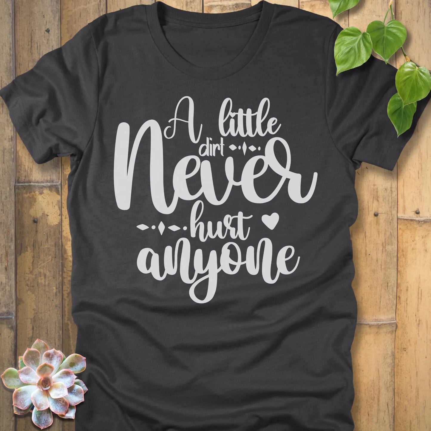 Dark Grey Heather gardening t-shirt featuring the design A Little Dirt printed in white letters