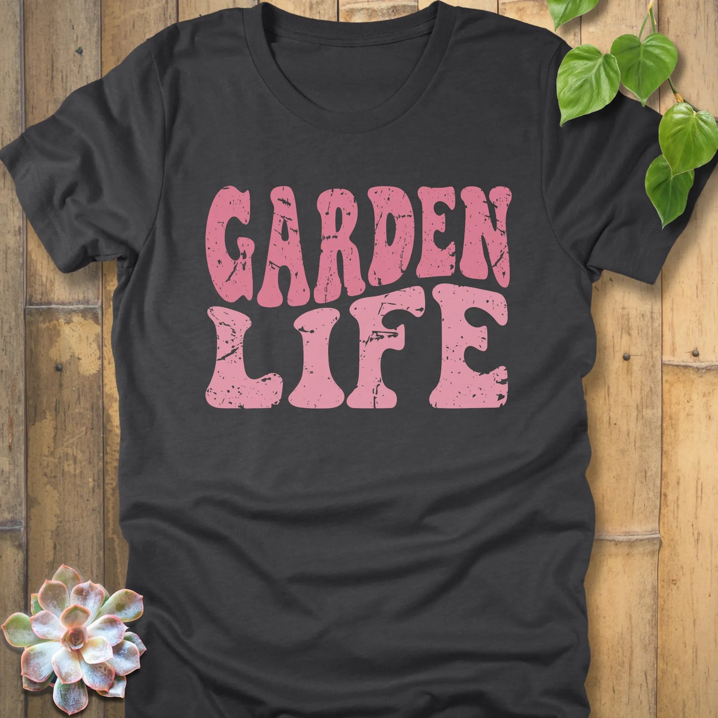 Dark Grey Heather t-shirt featuring the Garden Life graphic tee design in bold pink letters, casual graphic shirt