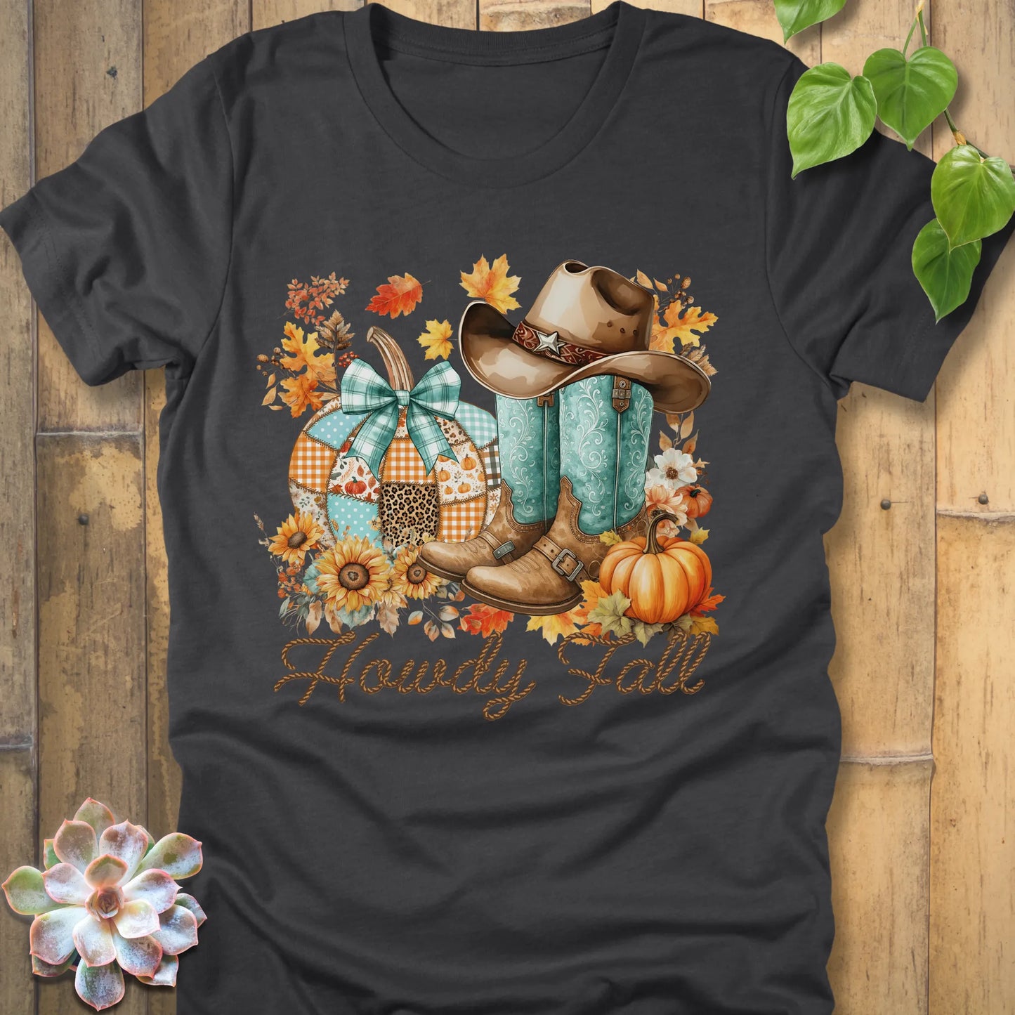 Dark grey heather t-shirt featuring the design Howdy Fall with flowers, boots and hats