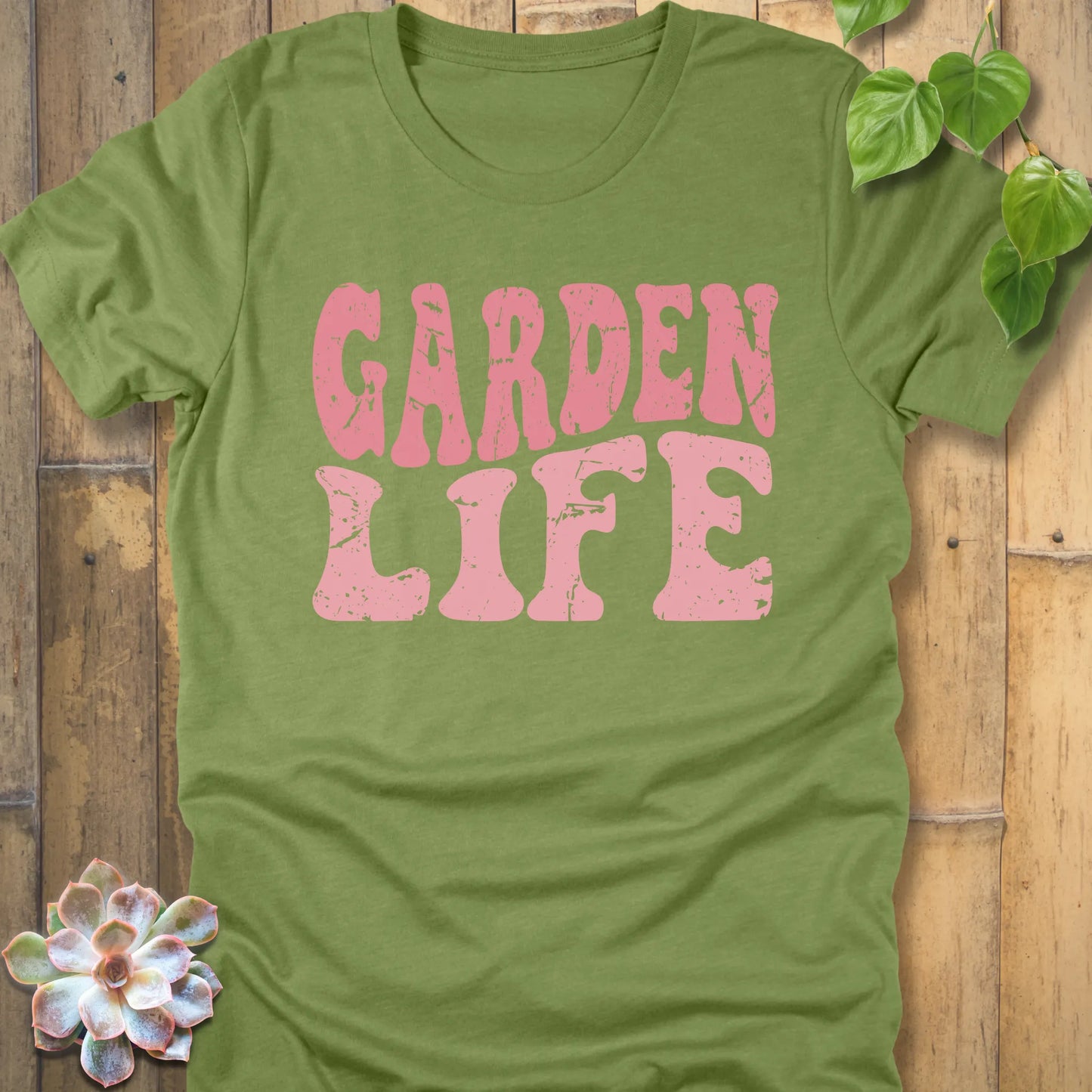 Heather Green t-shirt featuring the Garden Life graphic tee design in bold pink letters, casual graphic shirt