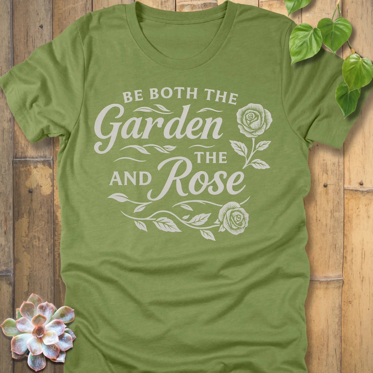 Heather Green t-shirt featuring the design Garden and the Rose printed in bold letters, floral gardening shirt.