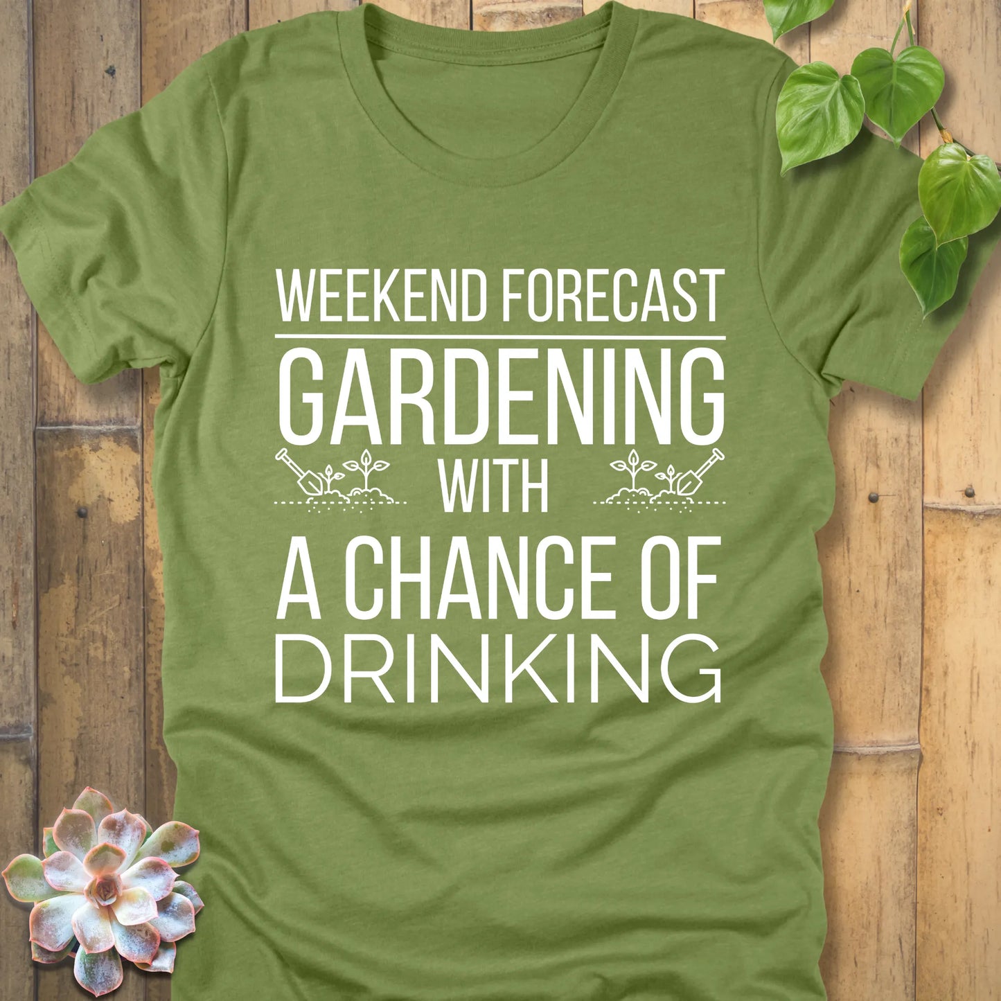Heather Green t-shirt featuring the design "Weekend forecast gardening with a chance of drinking" in bold letters, gardening gift tee.
