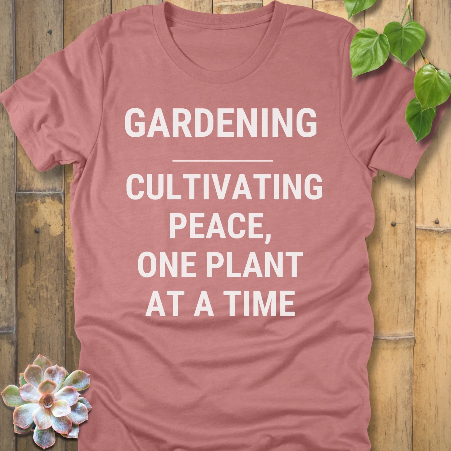 Heather Mauve t-shirt featuring the design Gardening Cultivating Peace, One Plant At A Time printed in bold white letters, funny gardening shirt.