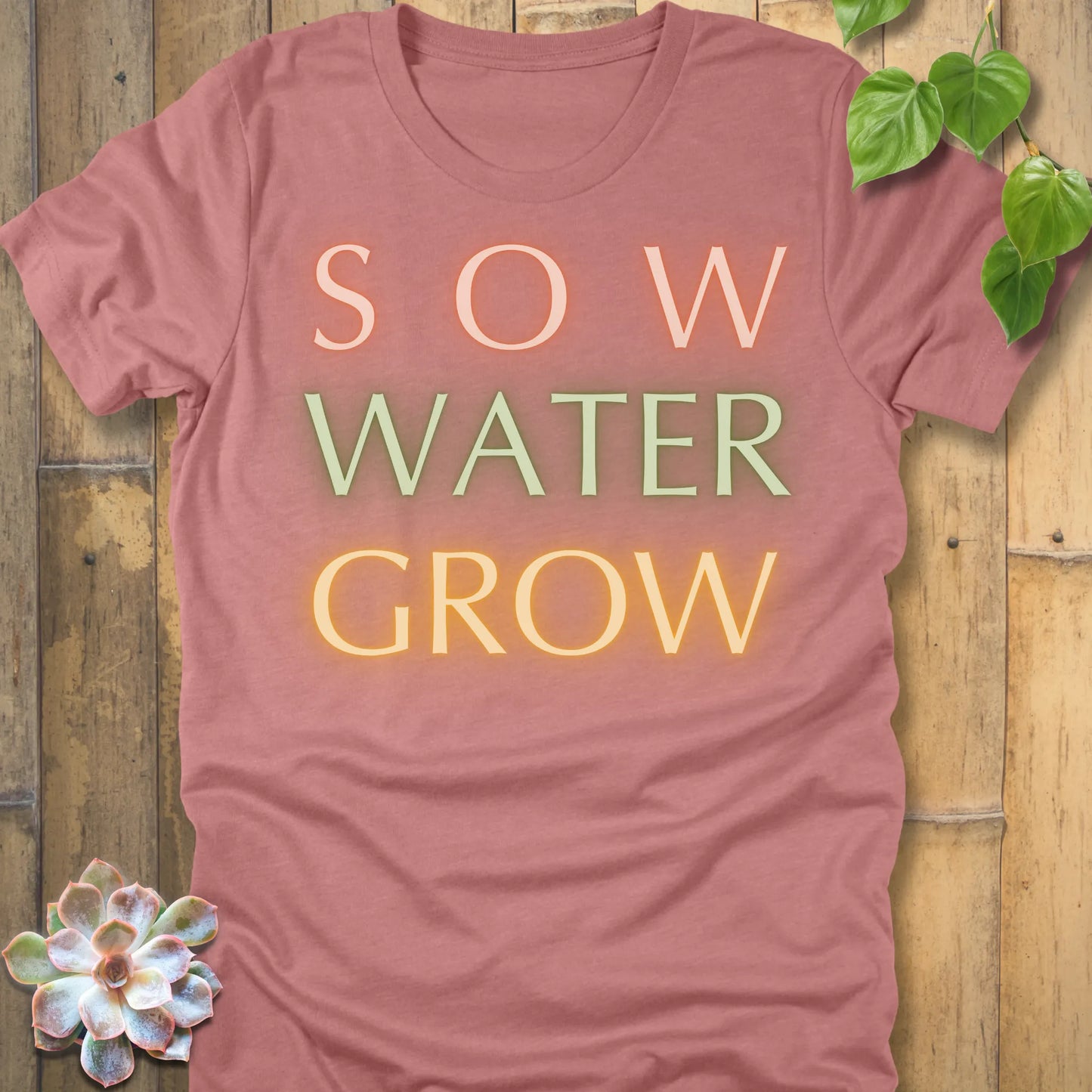 Heather Mauve t-shirt featuring the design Grow Dammit printed in bold letters, funny gardening shirt.