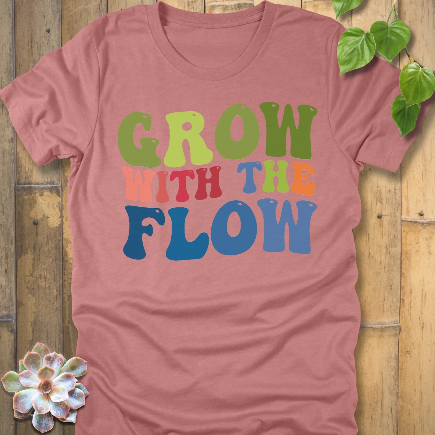 Heather Mauve t-shirt featuring the design Grow In The Flow printed in colourful bold letters