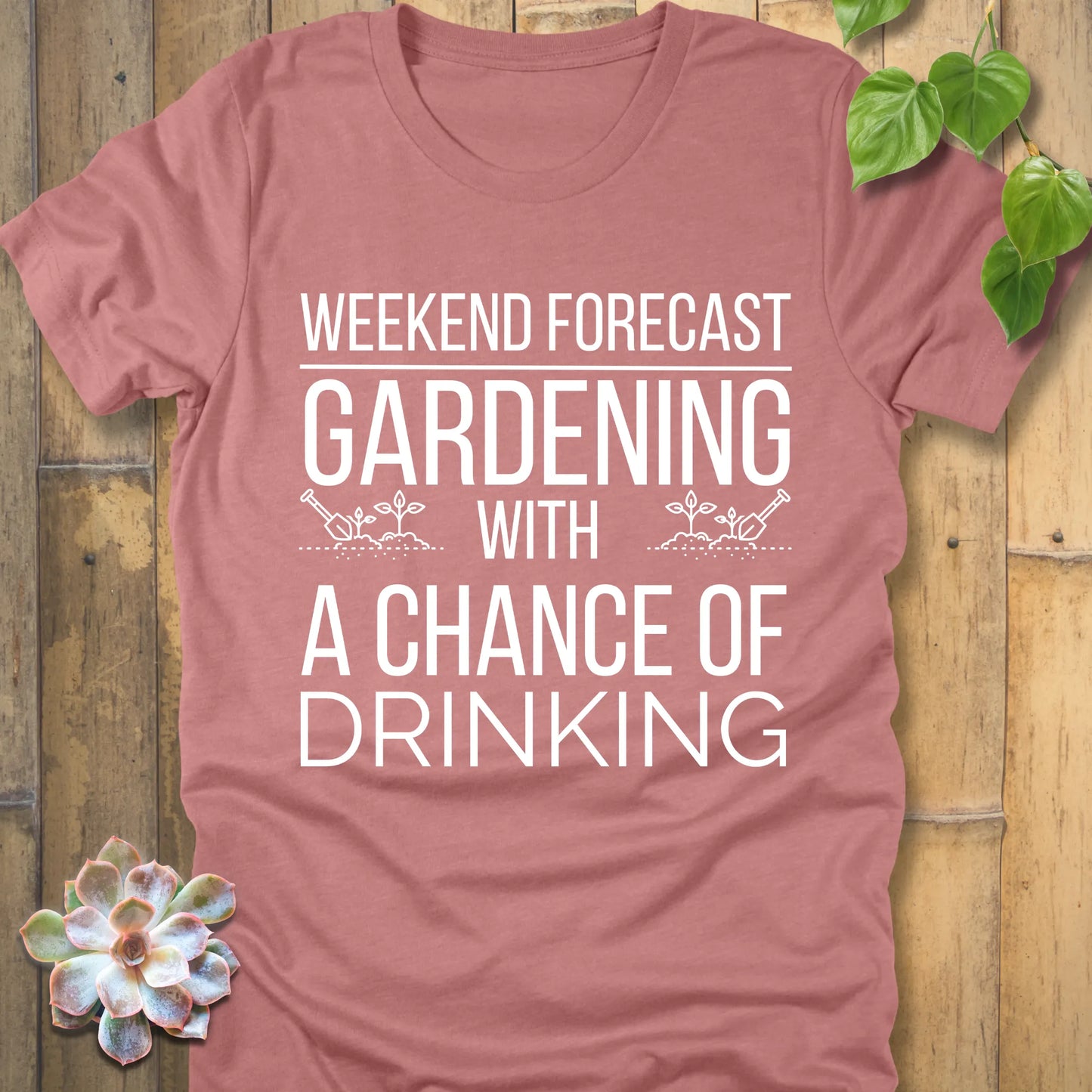 Heather Mauve t-shirt featuring the design "Weekend forecast gardening with a chance of drinking" in bold letters, gardening gift tee.