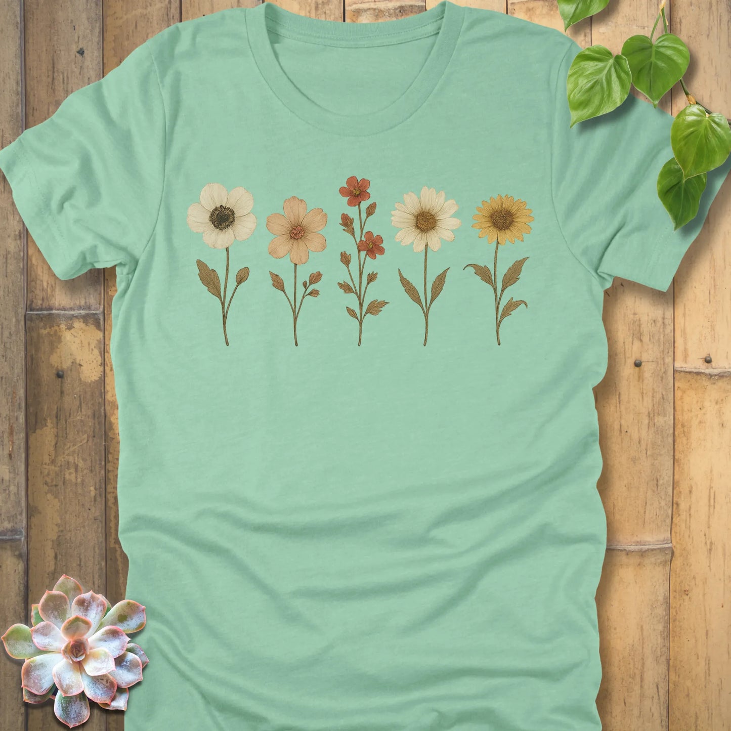 Heather Mint t-shirt featuring the design Pressed Flowers printed in delicate floral pattern, botanical graphic tee.