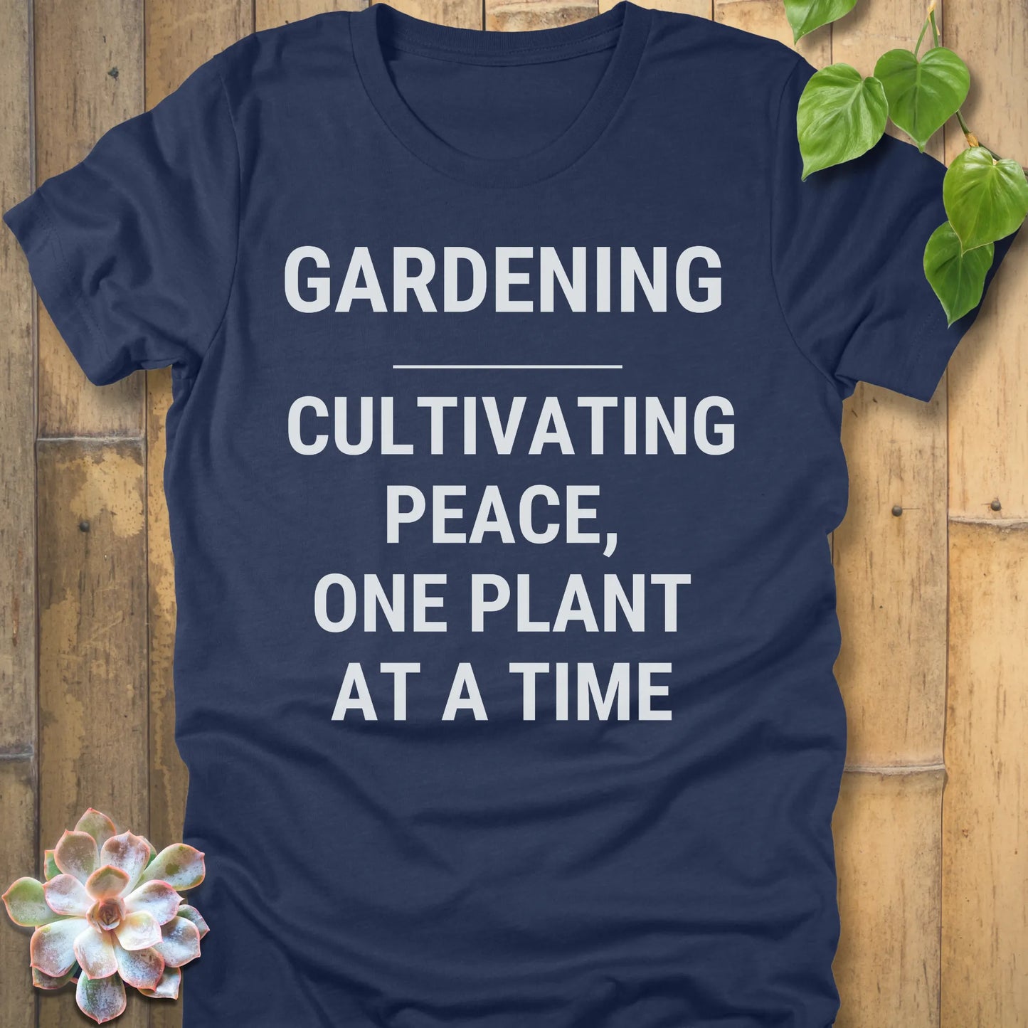 Heather Navy t-shirt featuring the design Gardening Cultivating Peace, One Plant At A Time printed in bold white letters, funny gardening shirt.