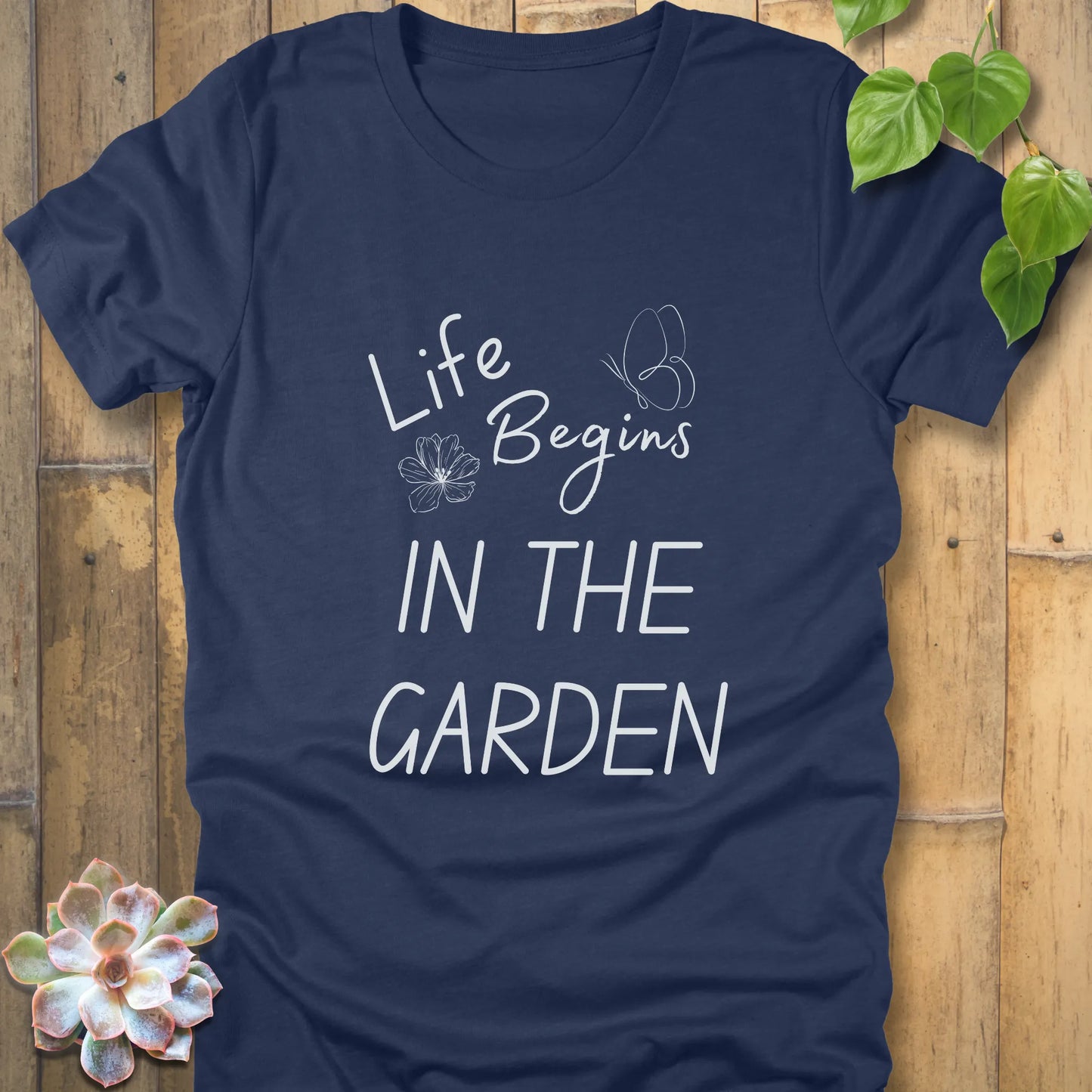 Heather Navy t-shirt featuring the design Life begin's in the garden, unisex gardening graphic shirt.