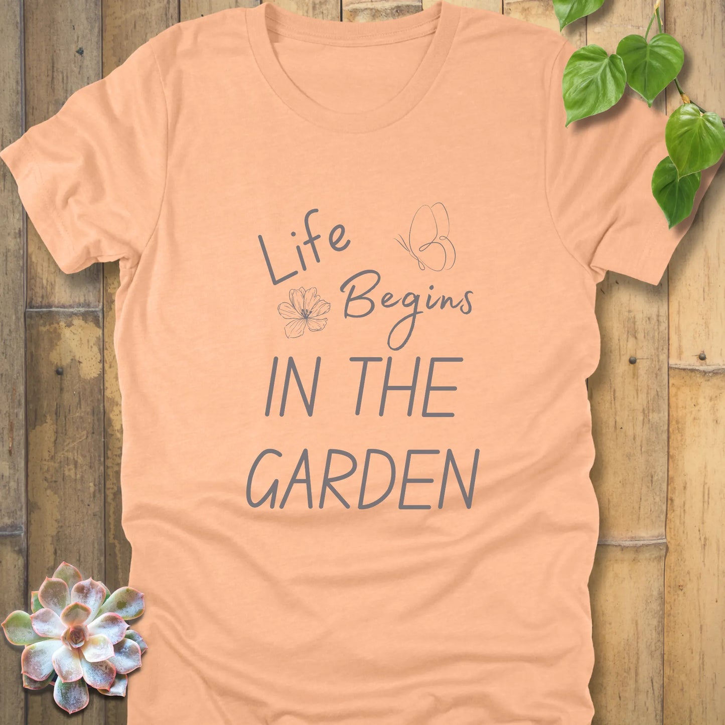 Heather Peach t-shirt featuring the design Life begin's in the garden, floral gardening gift shirt.