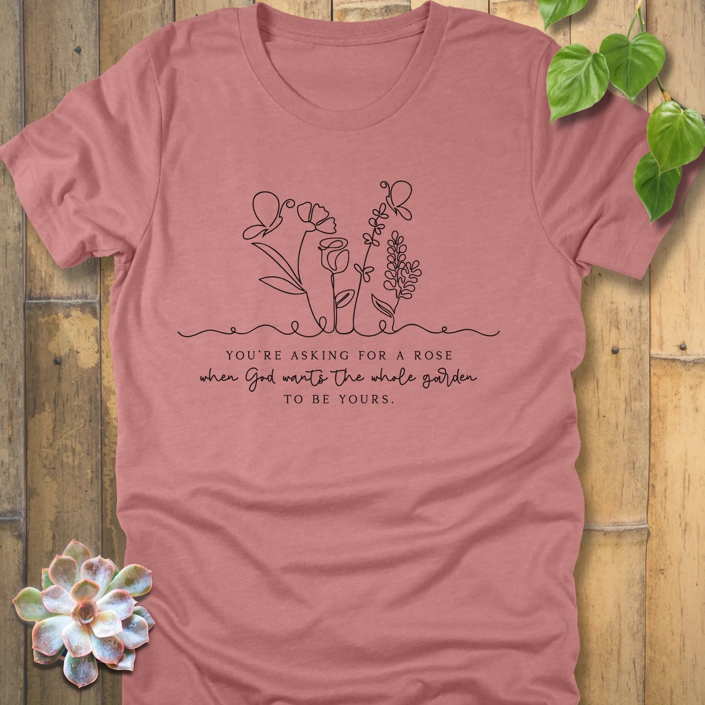 Heather mauve t-shirt featuring the design Asking for a rose, printed in black letters, stylish fashion tee