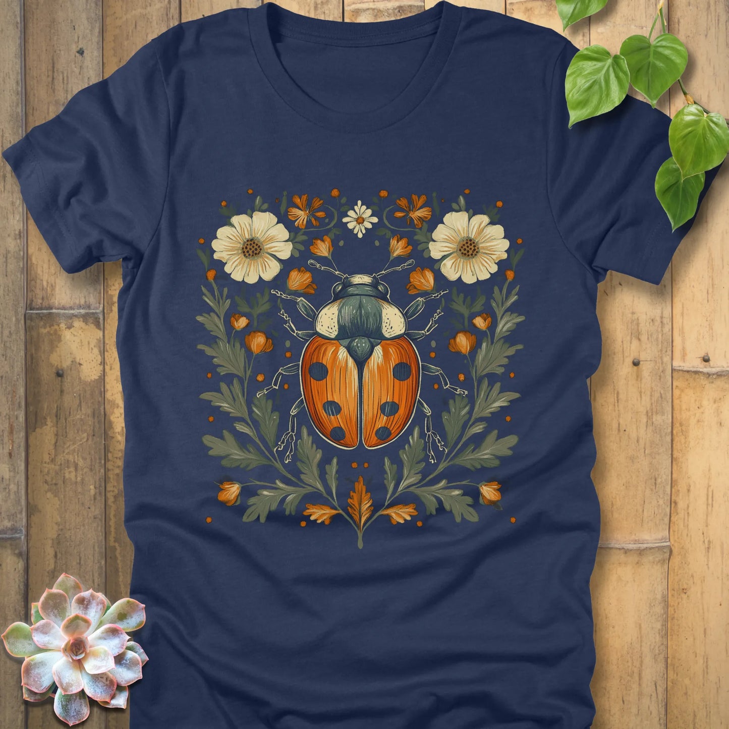 Heather navy t-shirt featuring the design Blossom Beetle printed with flowers and beetle