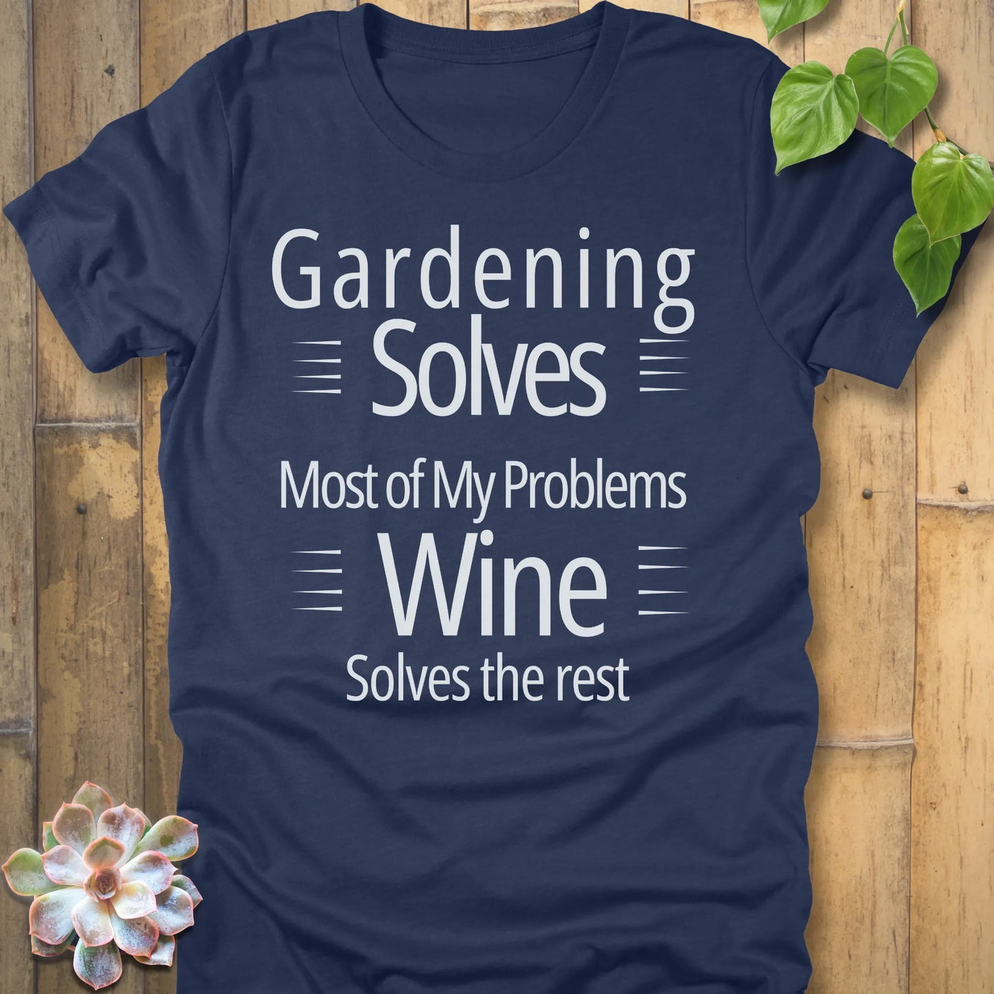 Heather peach t-shirt featuring the design Gardening solves most of my problems, wine solves the rest printed in bold black letters.