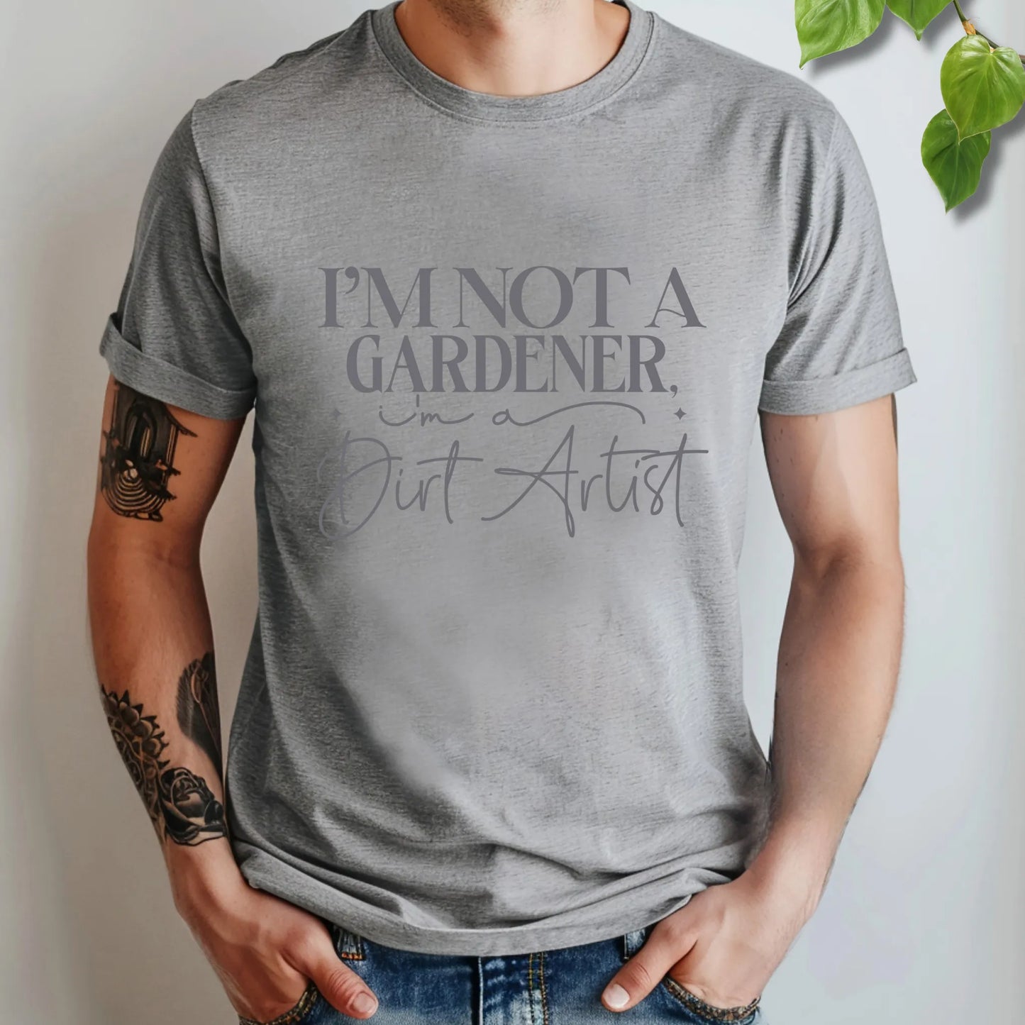 Athletic Heather Bella Canvas 3001 unisex t-shirt with white print: ‘I’m not a gardener, I’m a dirt artist