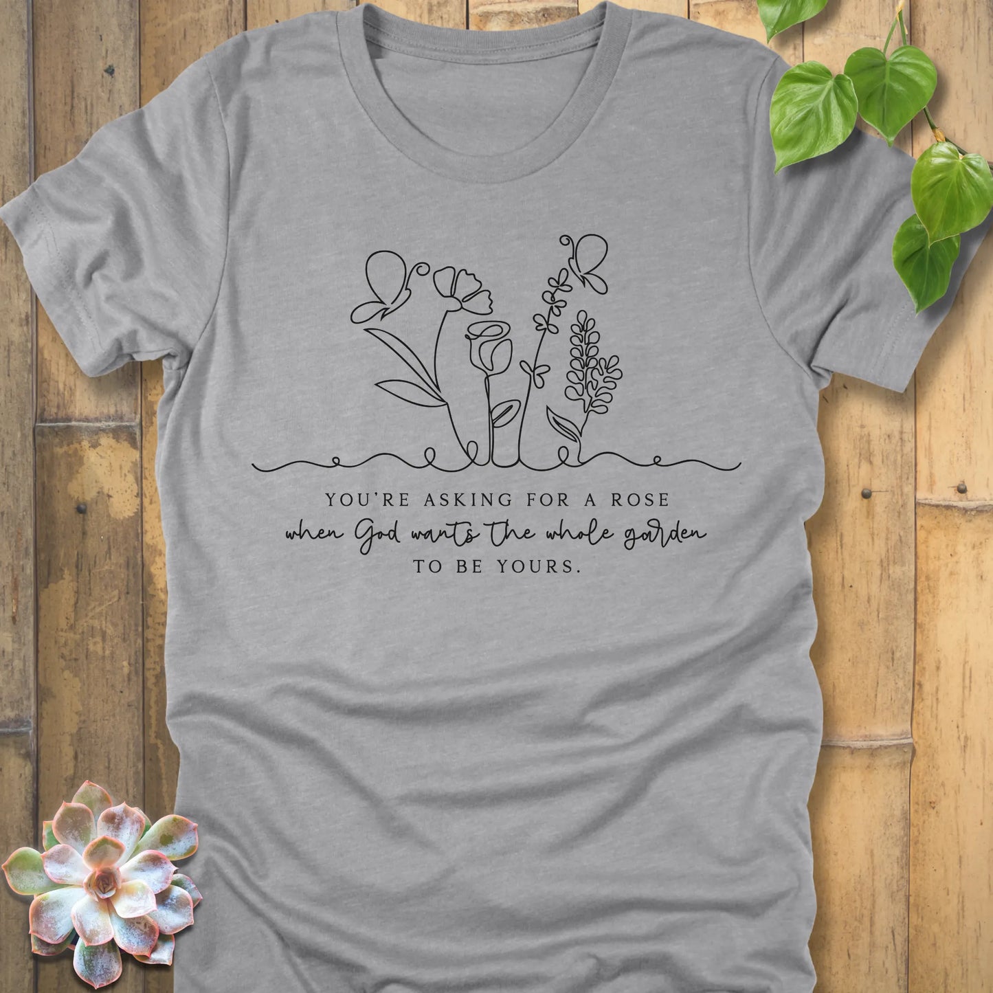 Athletic Heather t-shirt featuring the design Asking for a rose, printed in black letters, soft pastel cotton shirt