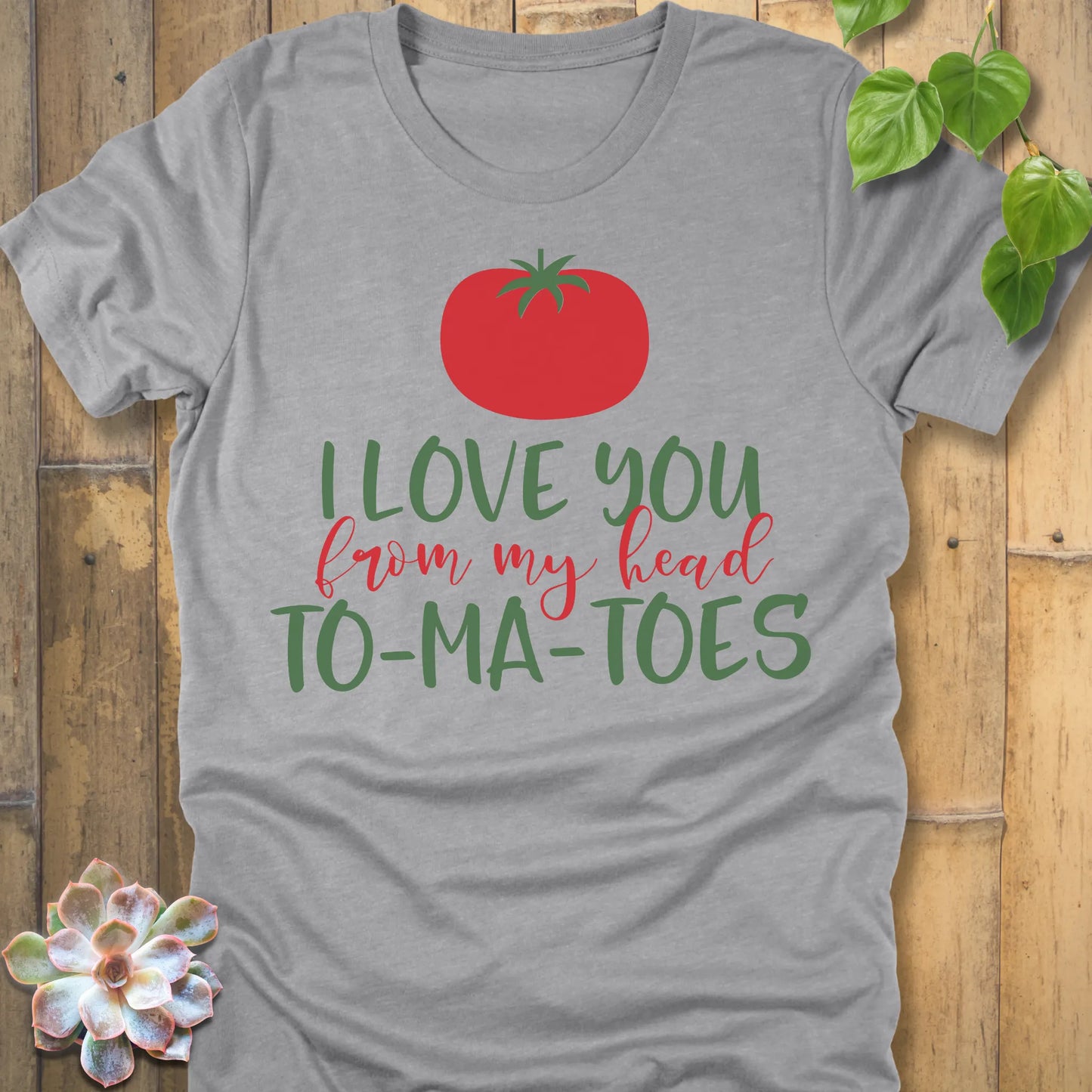 Athletic Heather t-shirt featuring the design My Head To-Ma-Toes printed in bold letters, funny tomato gardening shirt.