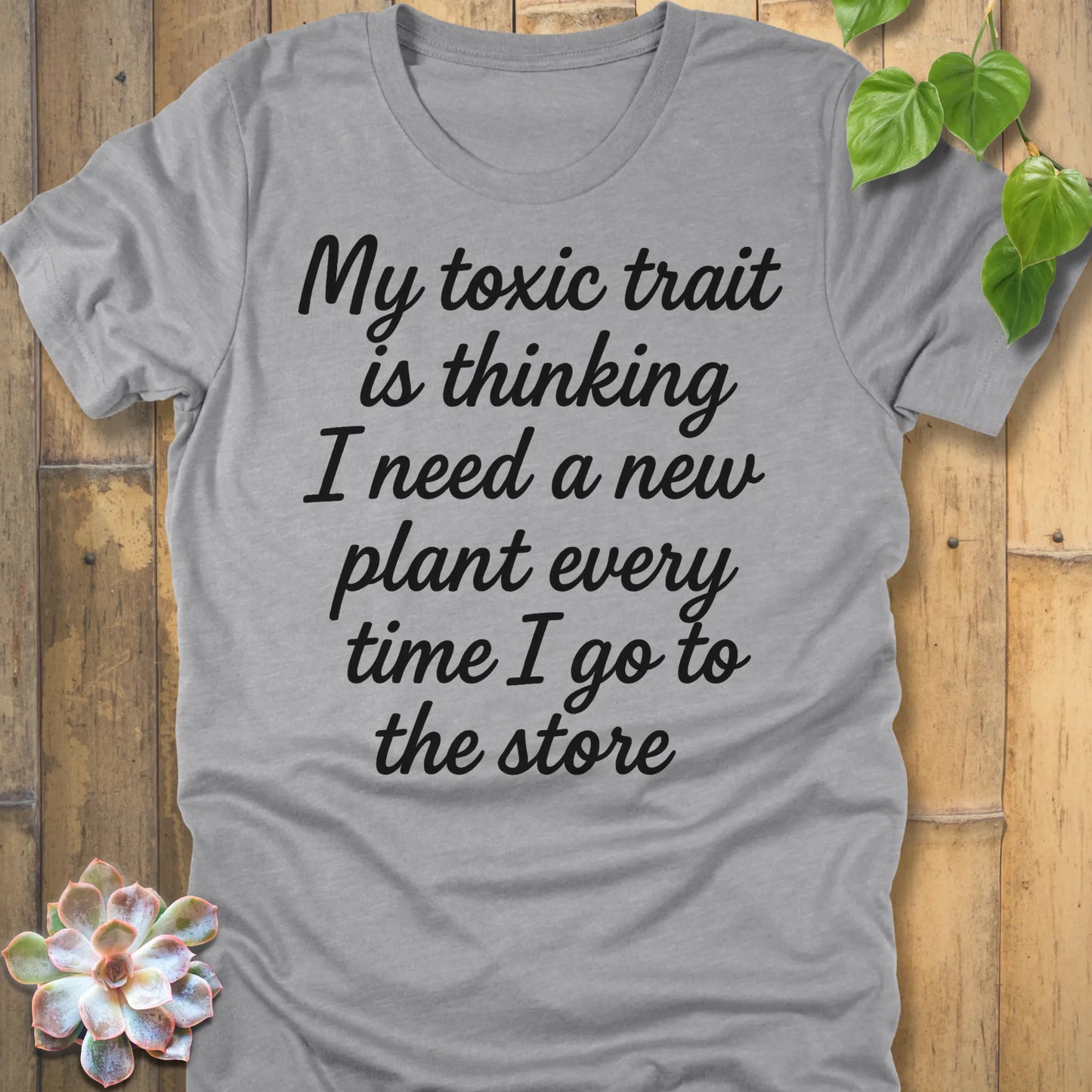 Athletic Heather t-shirt featuring the design My Toxic Trait printed in black letters, funny quote shirt.