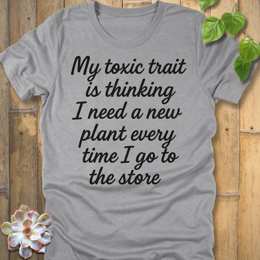 Athletic Heather t-shirt featuring the design My Toxic Trait printed in black letters, funny quote shirt.