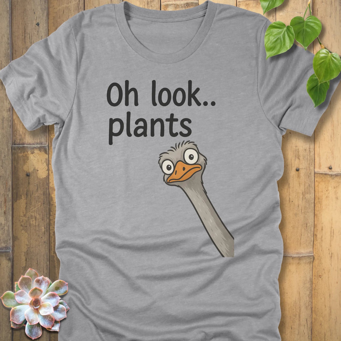 Athletic Heather t-shirt featuring the design Oh Look Plants printed in black letters, with animal.