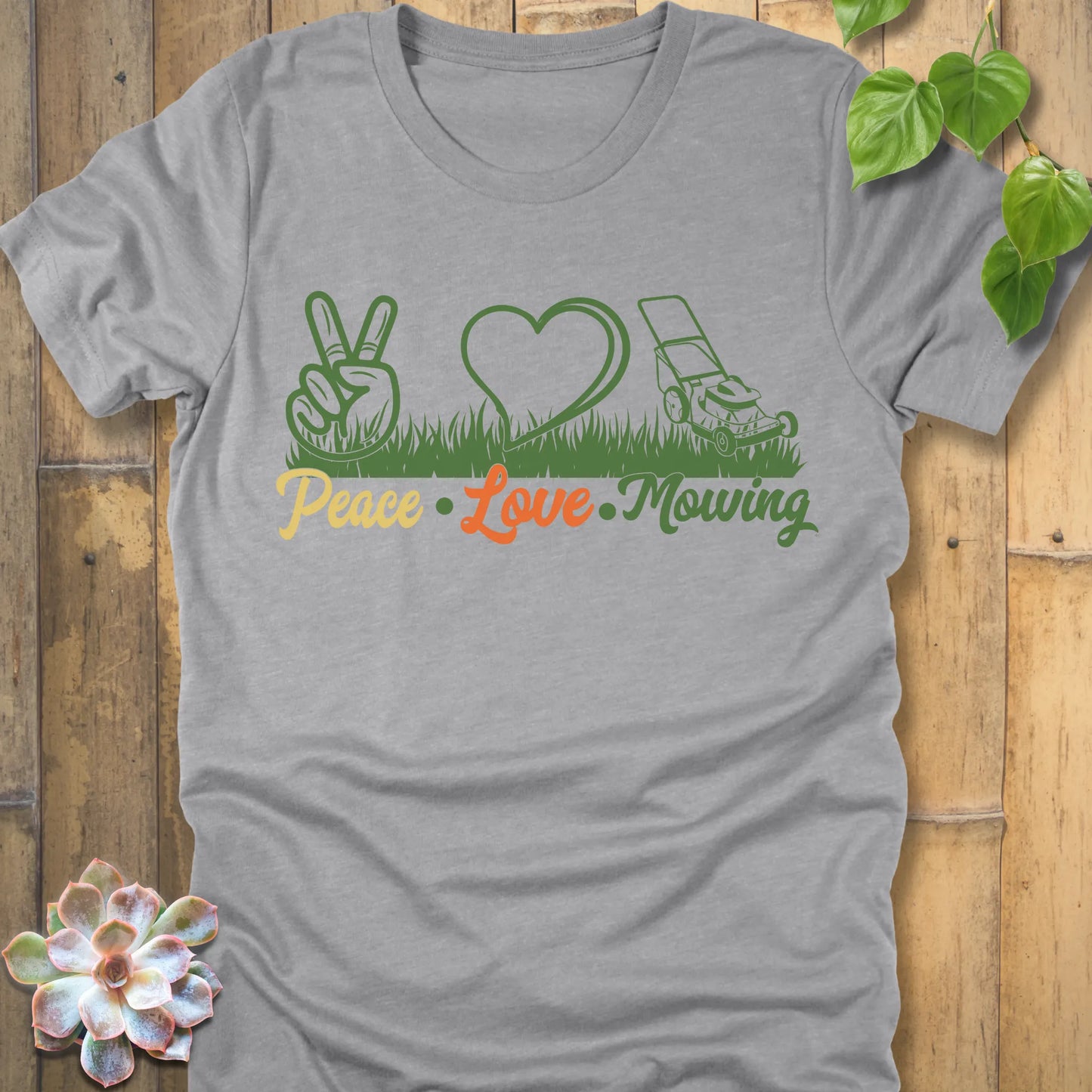 Athletic Heather t-shirt featuring the design Peace, Love, Mowing with peace sign, heart and mower