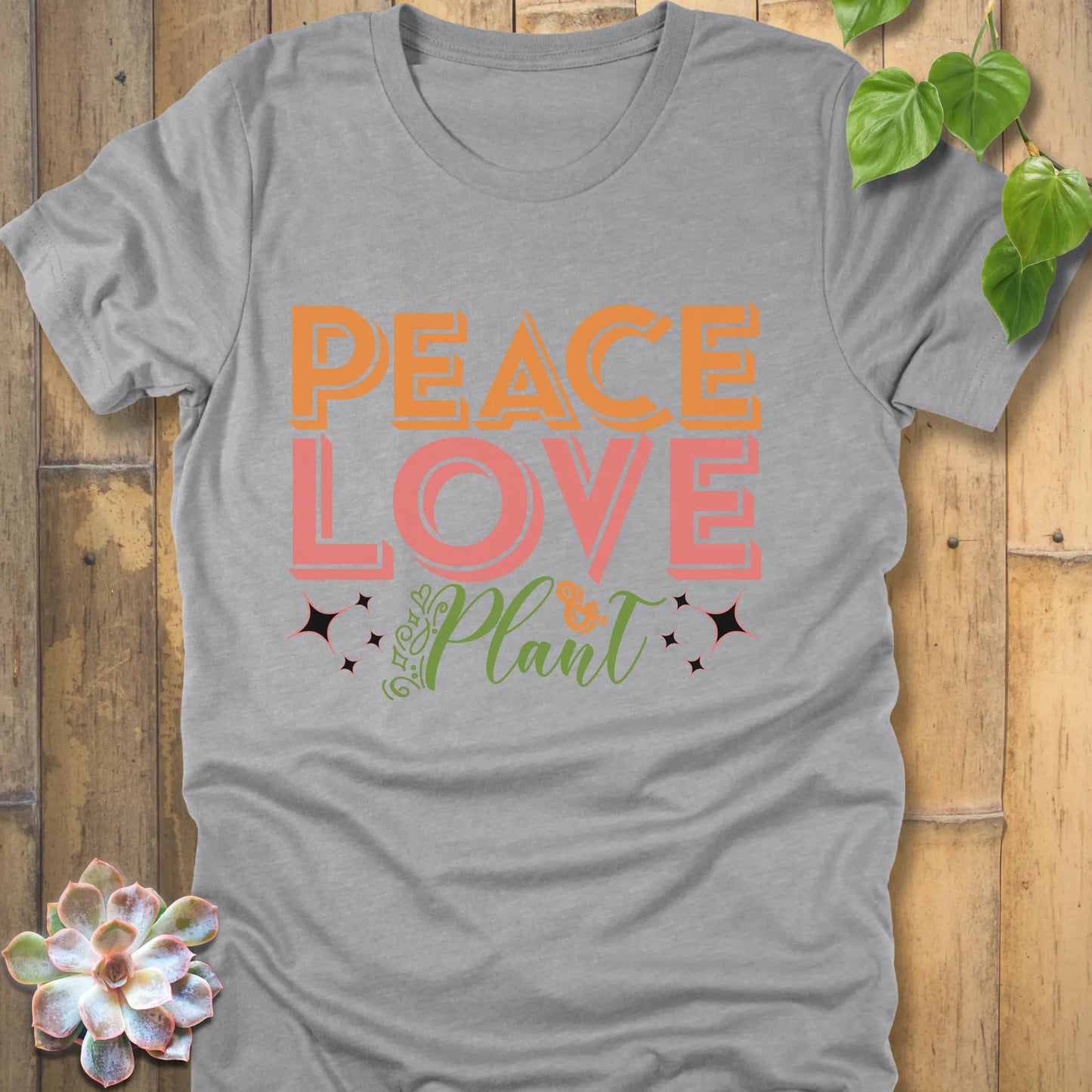 Athletic Heather t-shirt featuring the design Peace Love Plant printed in bold letters, ethical everyday wear shirt