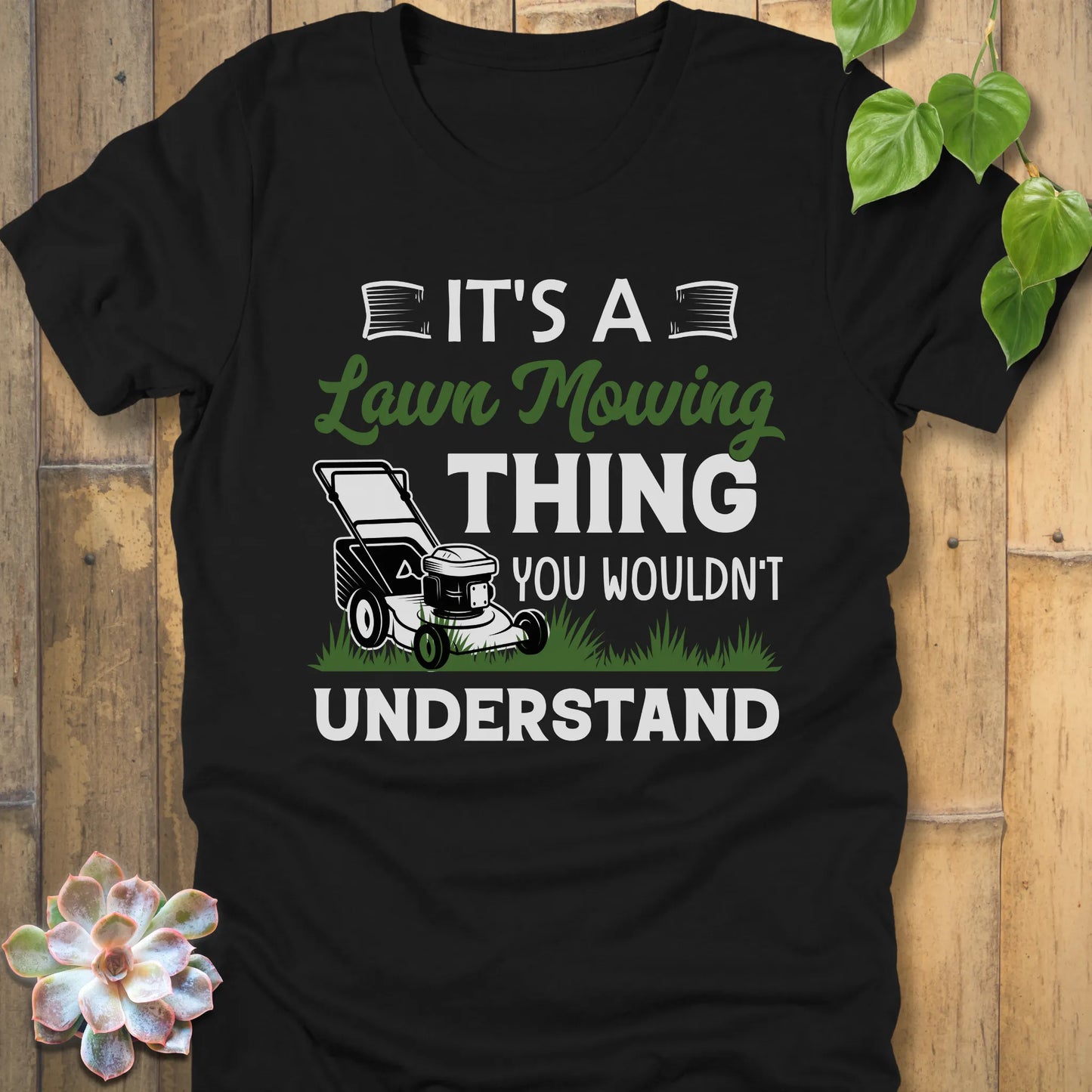 Black t-shirt featuring the design It's A Lawn Mowing Thing You Wouldn't Understand printed with a lawn mower