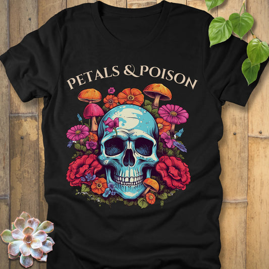 Black t-shirt featuring the design Petals & Poison printed in bold letters and a flowers, mushroom and skull