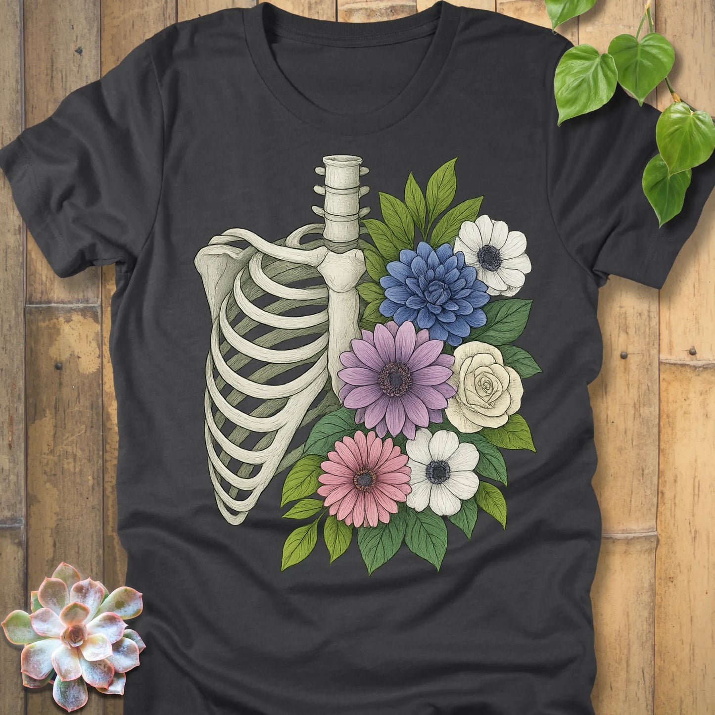 Floral Bones T-shirt in Dark Grey Heather – skeleton ribcage with pastel flowers graphic, lightweight unisex tee