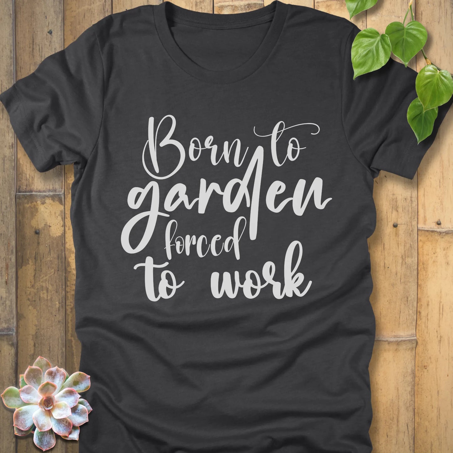 Dark Grey Heather t-shirt featuring the design Born to garden force to work printed in white letters