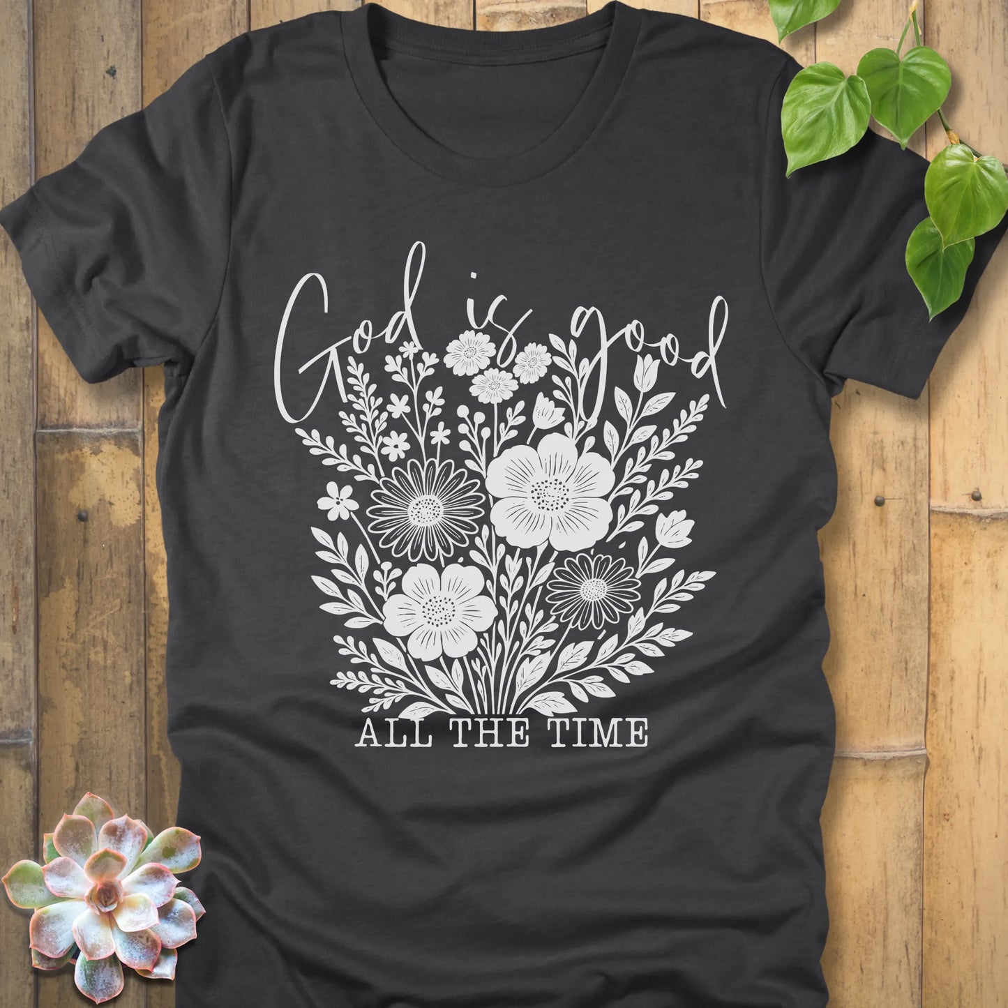 Dark Grey Heather t-shirt featuring the design God is Good printed with flowers in a soft floral style