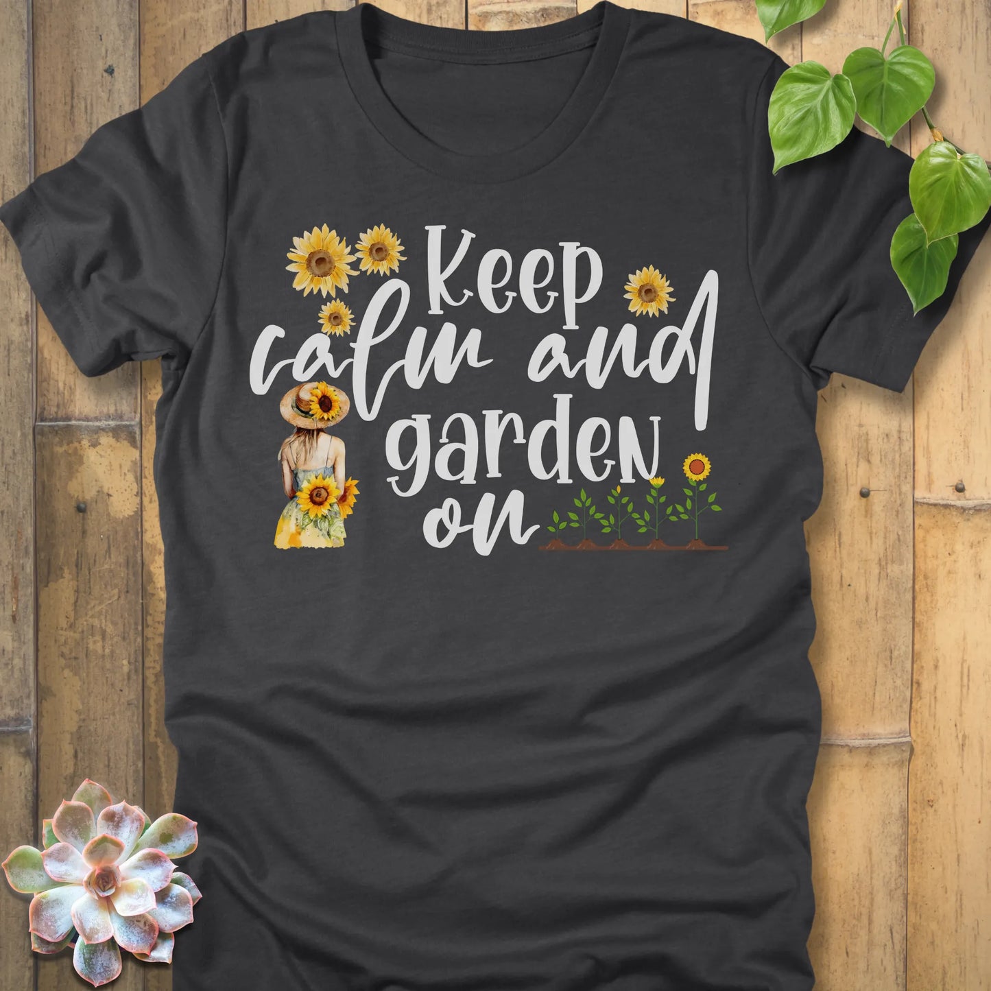 Dark Grey Heather t-shirt featuring the design Keep Calm printed in white letters and sunflowers