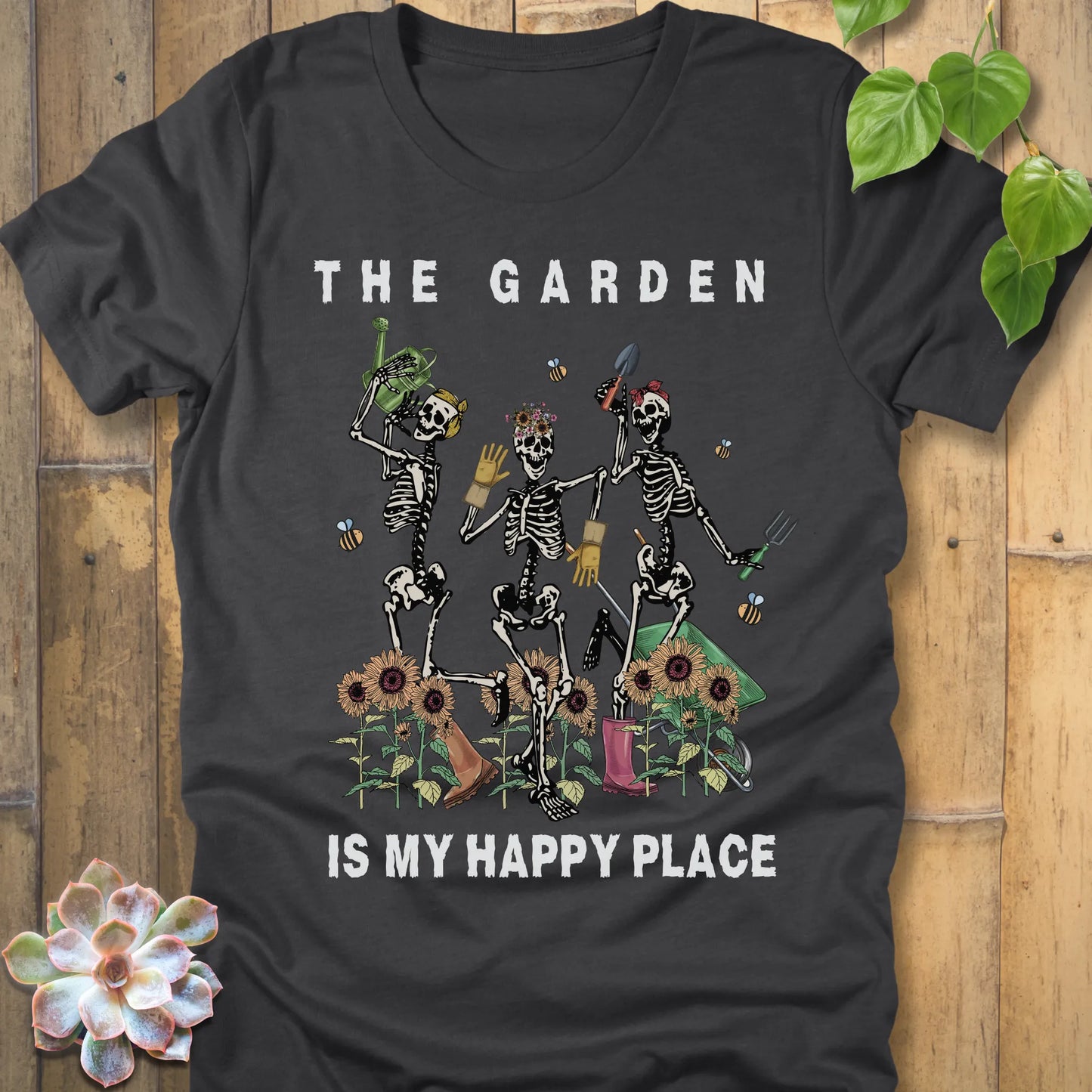 Dark Grey Heather t-shirt featuring the design "My Happy Place" printed in bold white letters and a happy skeleton 
