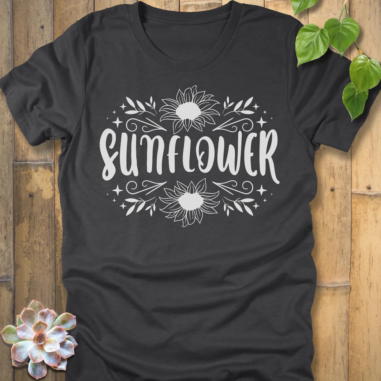 Dark Grey Heather t-shirt featuring the design Sunflower printed in white letters and sunflower, floral graphic tee.