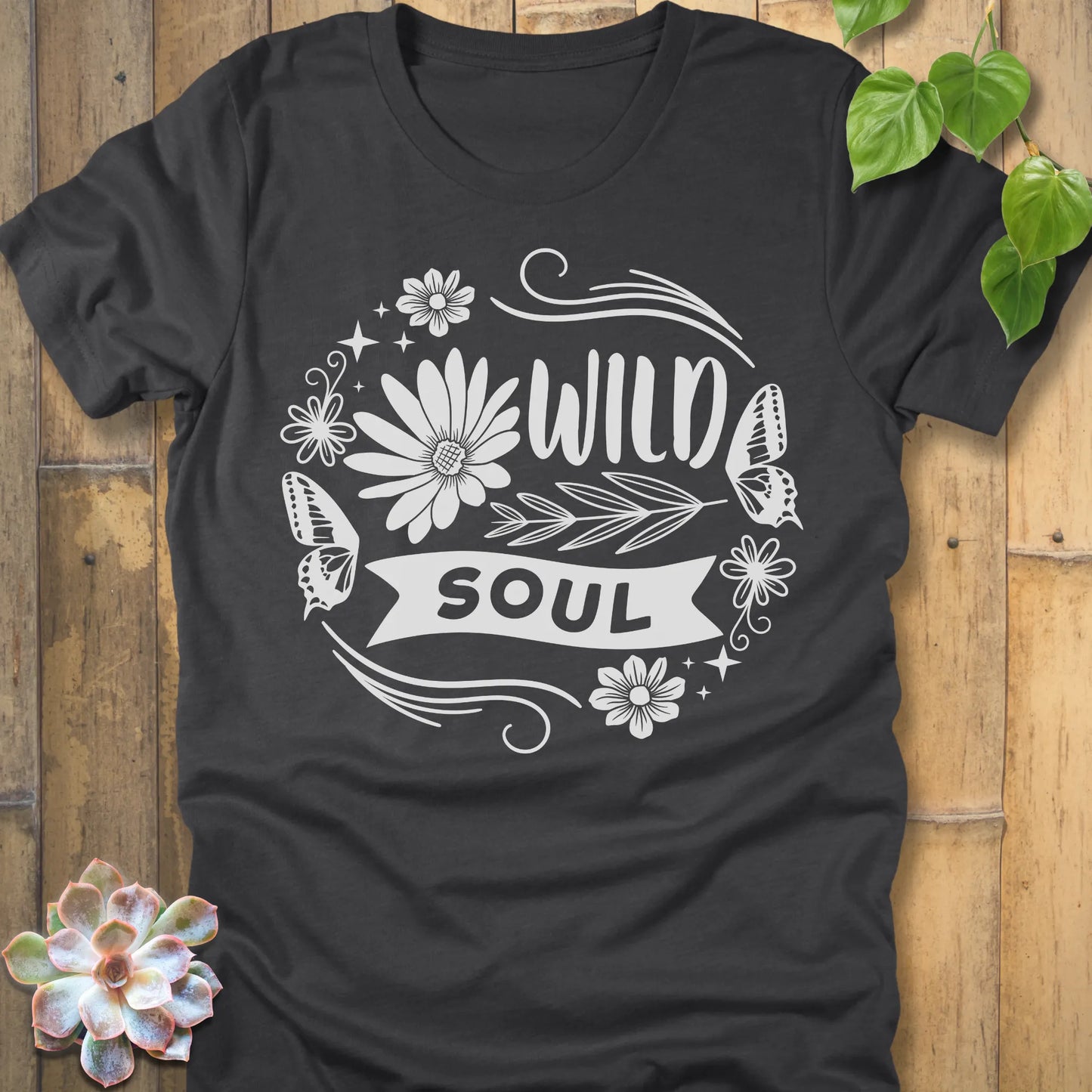 Dark Grey Heather t-shirt featuring the design Wild Soul printed in bold letters and flower, butterfly