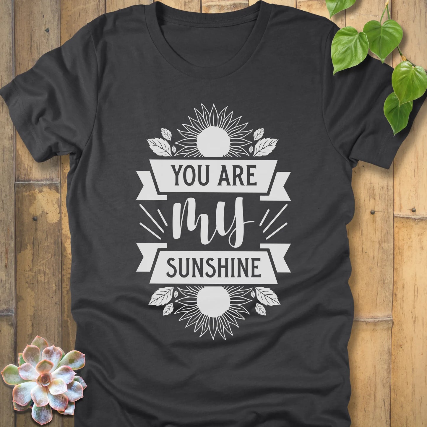 Dark Grey Heather t-shirt featuring the design You are my sunshine printed in bold letters with a sunflower graphic