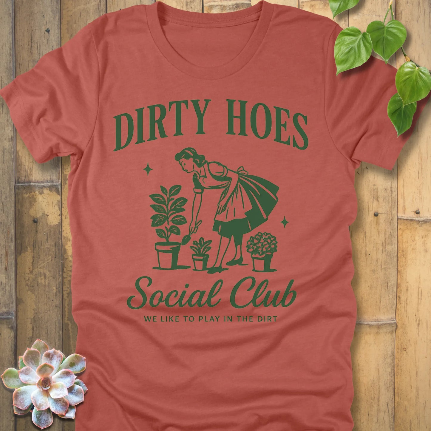 Heather Clay t-shirt featuring the design Dirty Hoes printed in funny gardening shirt.