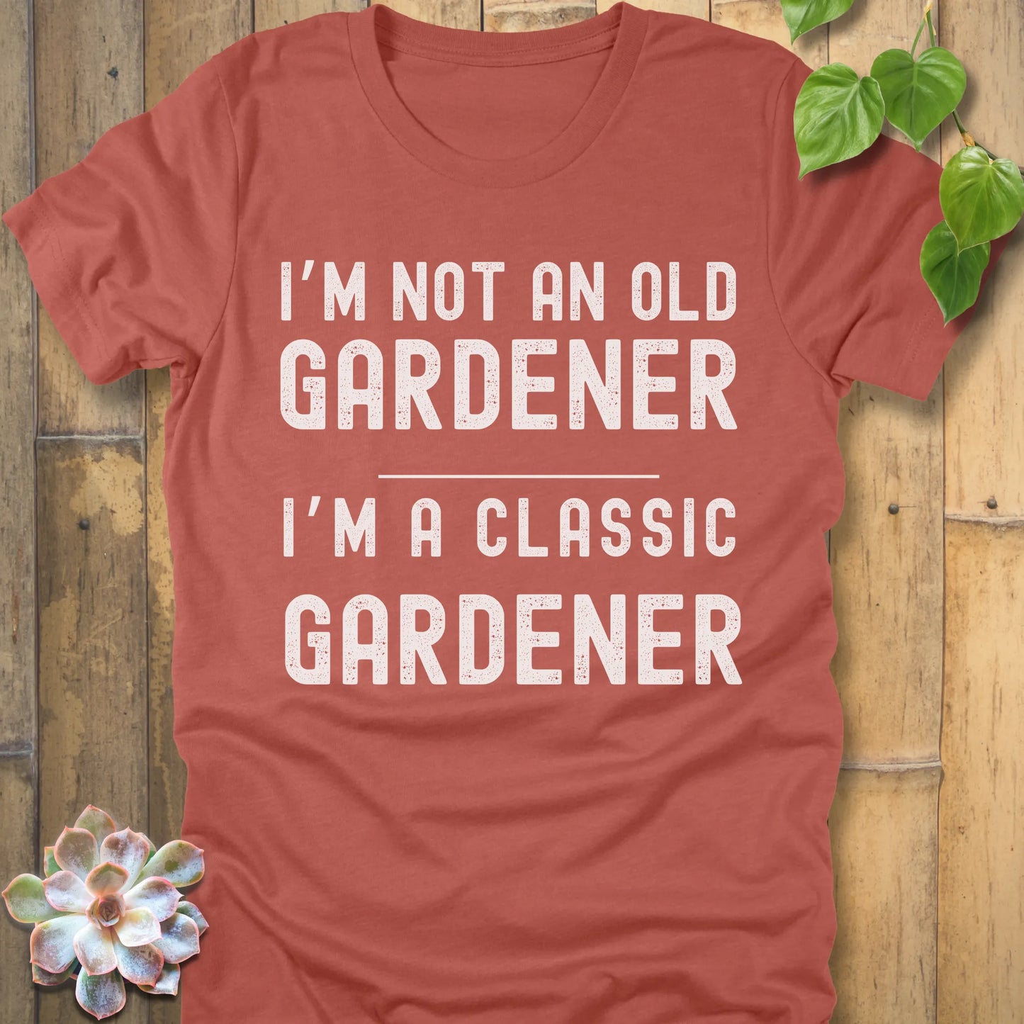 Heather Clay t-shirt featuring the design I'm Not An Old Gardener printed in bold black letters, funny gardening fall shirt.