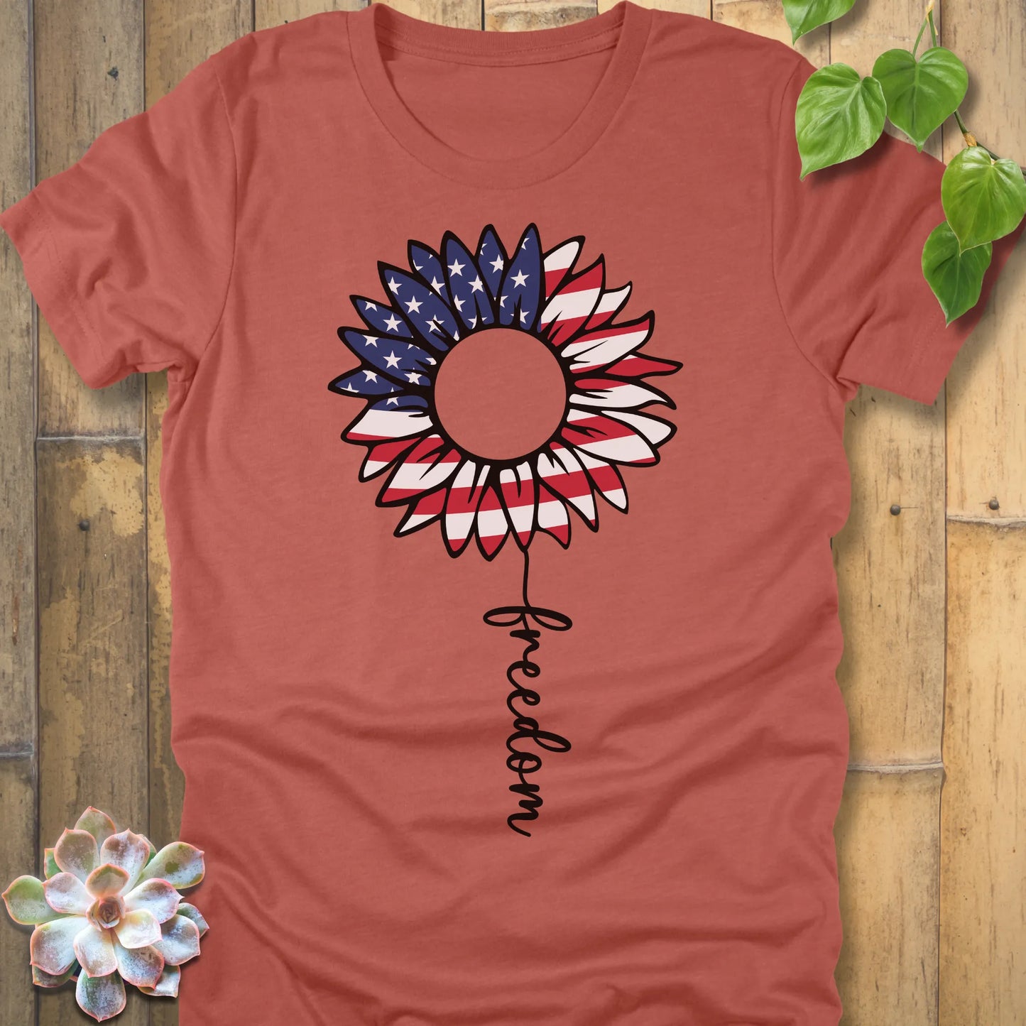 Heather Clay t-shirt featuring the design Patriotic Sunflower printed white and blue, USA flower shirt.