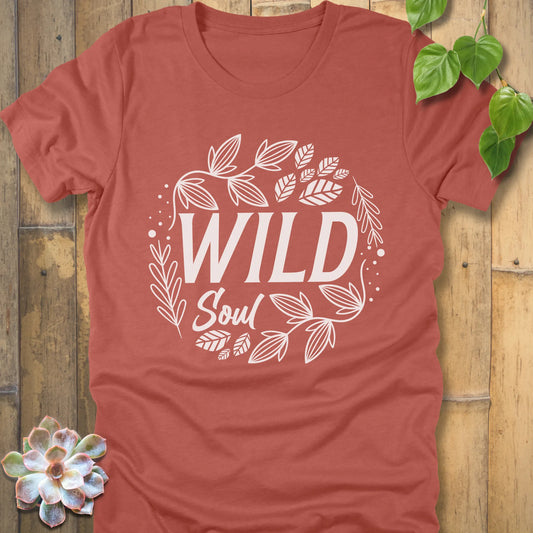 Heather Clay t-shirt featuring the design Wild Soul printed in black letters with leaves