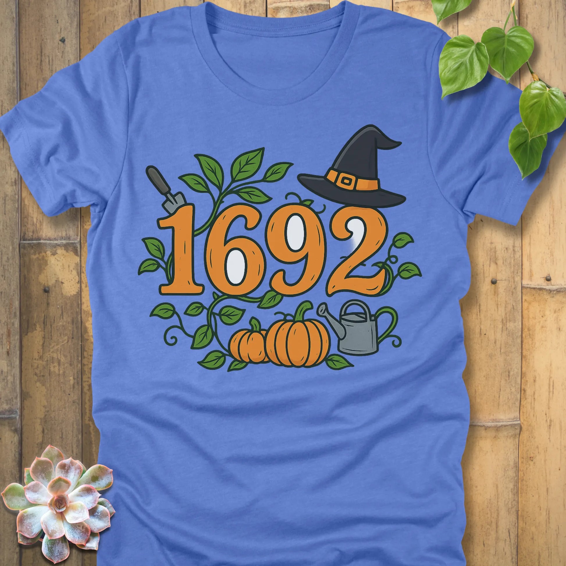 Heather Columbia Blue t-shirt featuring the design 1692 Halloween printed in spooky witch design shirt.