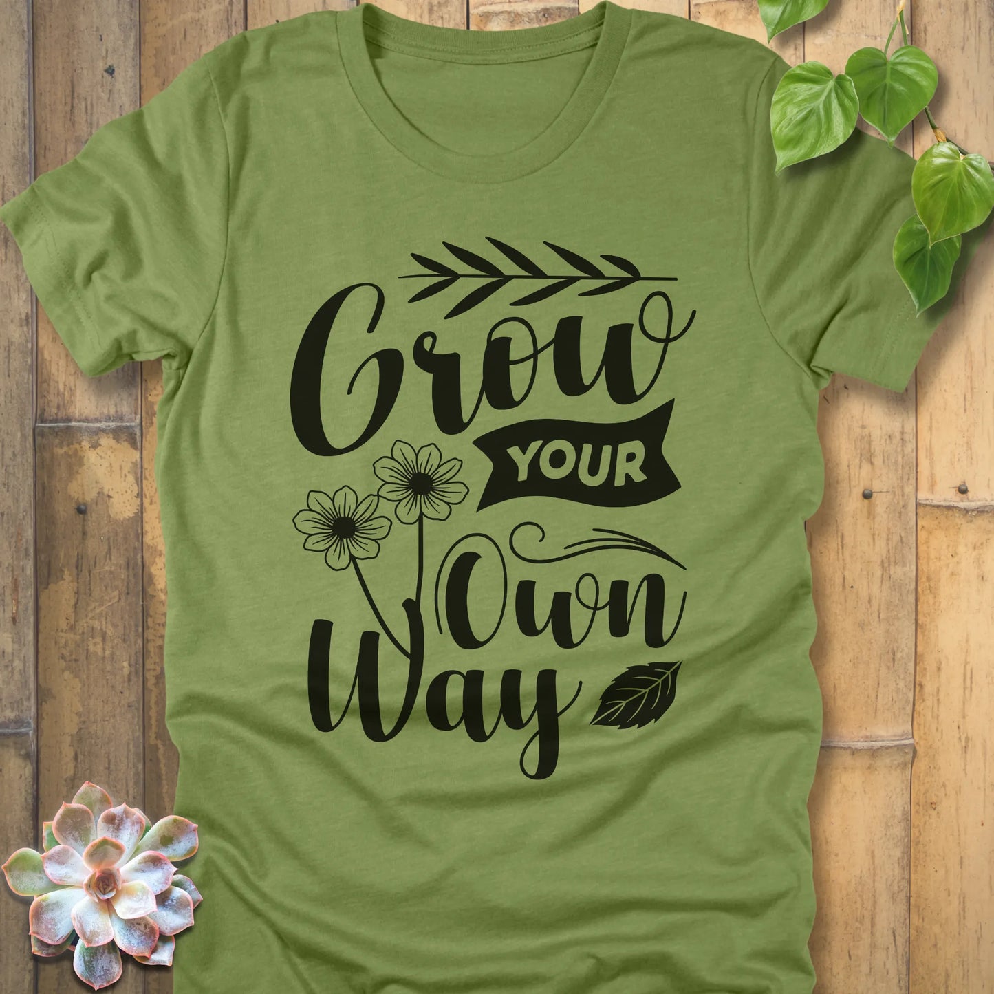 Heather Green cotton graphic t-shirt featuring the inspirational phrase Grow your own way, stylish casual wear.