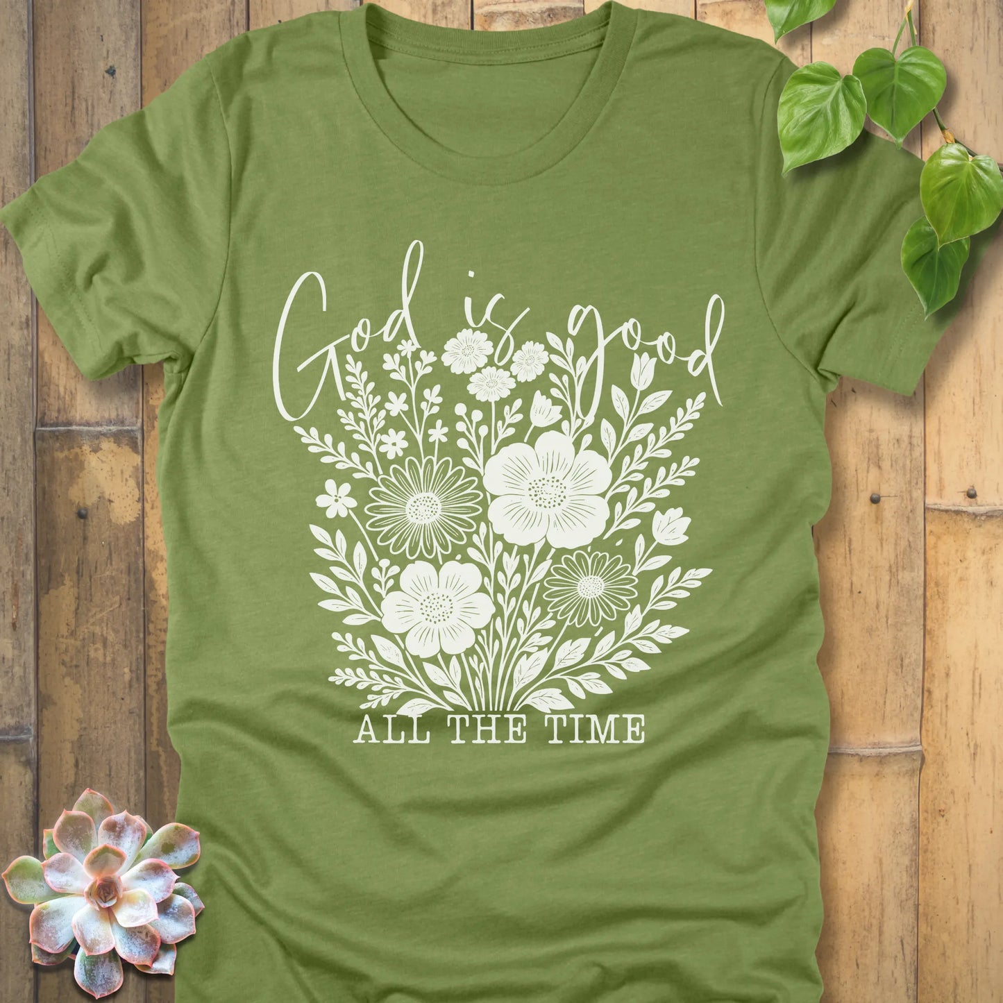 Heather Green t-shirt featuring the design God is Good printed with flowers in a soft floral style