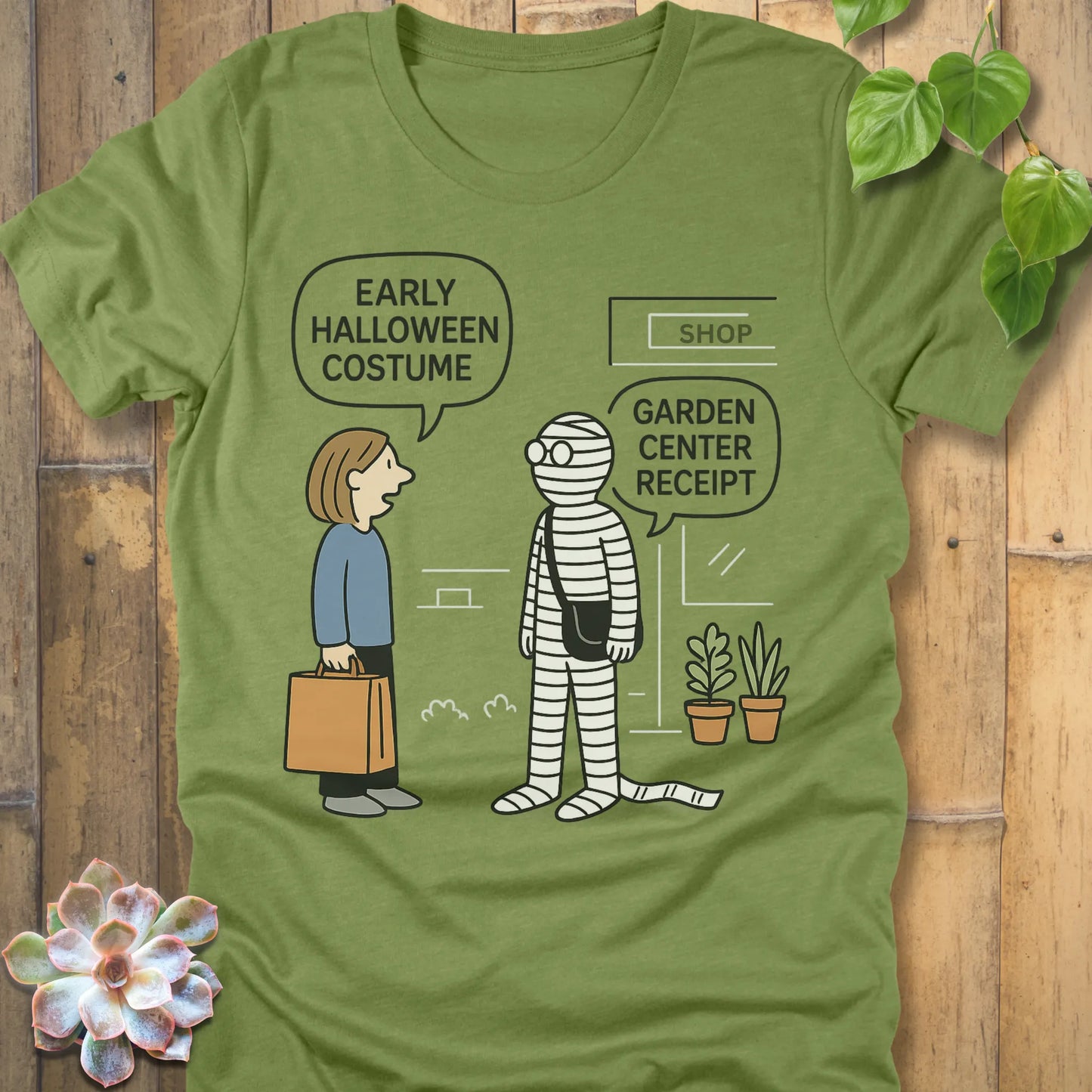 Heather Green t-shirt featuring the design Halloween Costume printed in bold black letters, funny Halloween shirt.